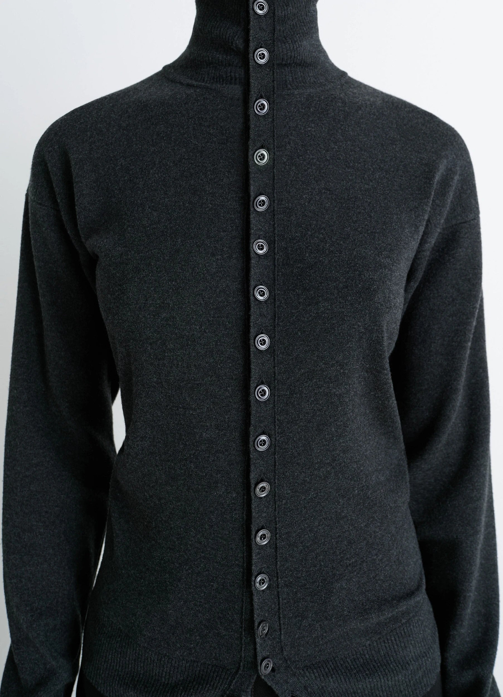 Lemaire buttoned fitted cardigan in dark heather mercerized wool, model shot, close-up front view high neck, button details