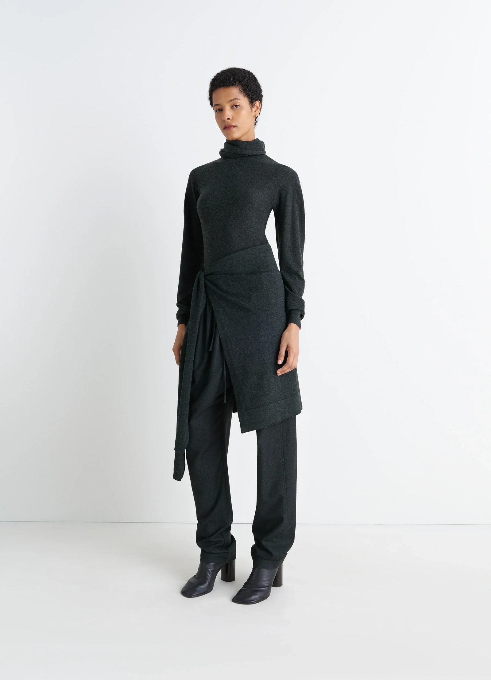 Lemaire crew neck sweater in lightly mercerized wool, model shot, three-quarter view long sleeves