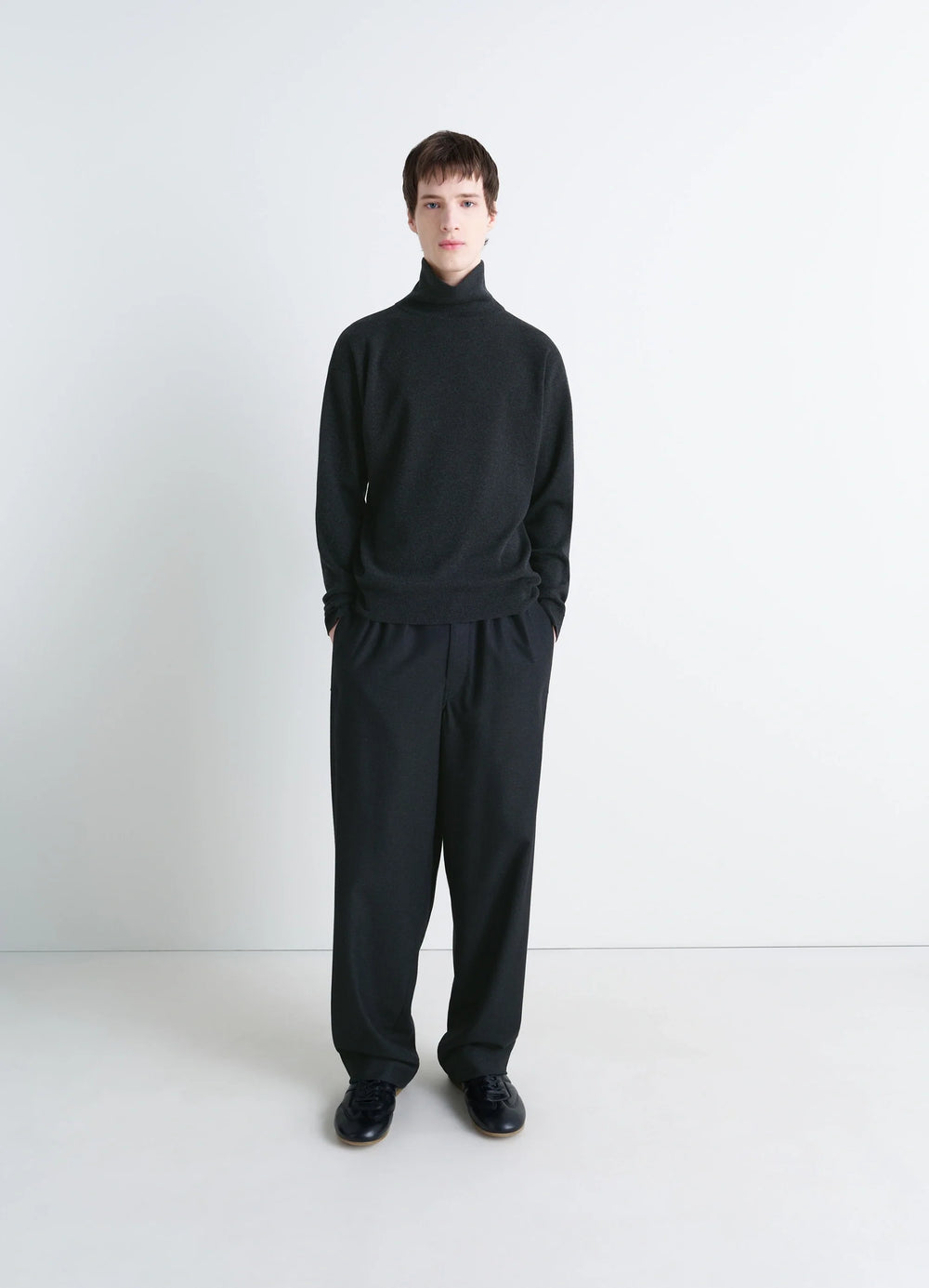 Lemaire High Neck Sweater in Lightly Mercerized Wool, model shot, side view high neck relaxed