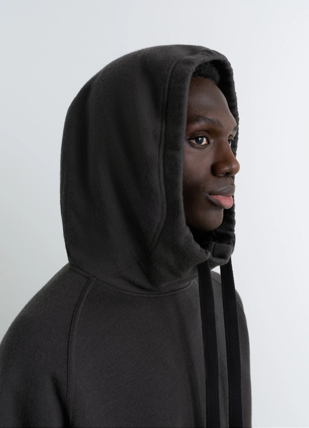 Lemaire Hooded Sweatshirt in Wool Cotton Blend, model shot, profile view hood detail