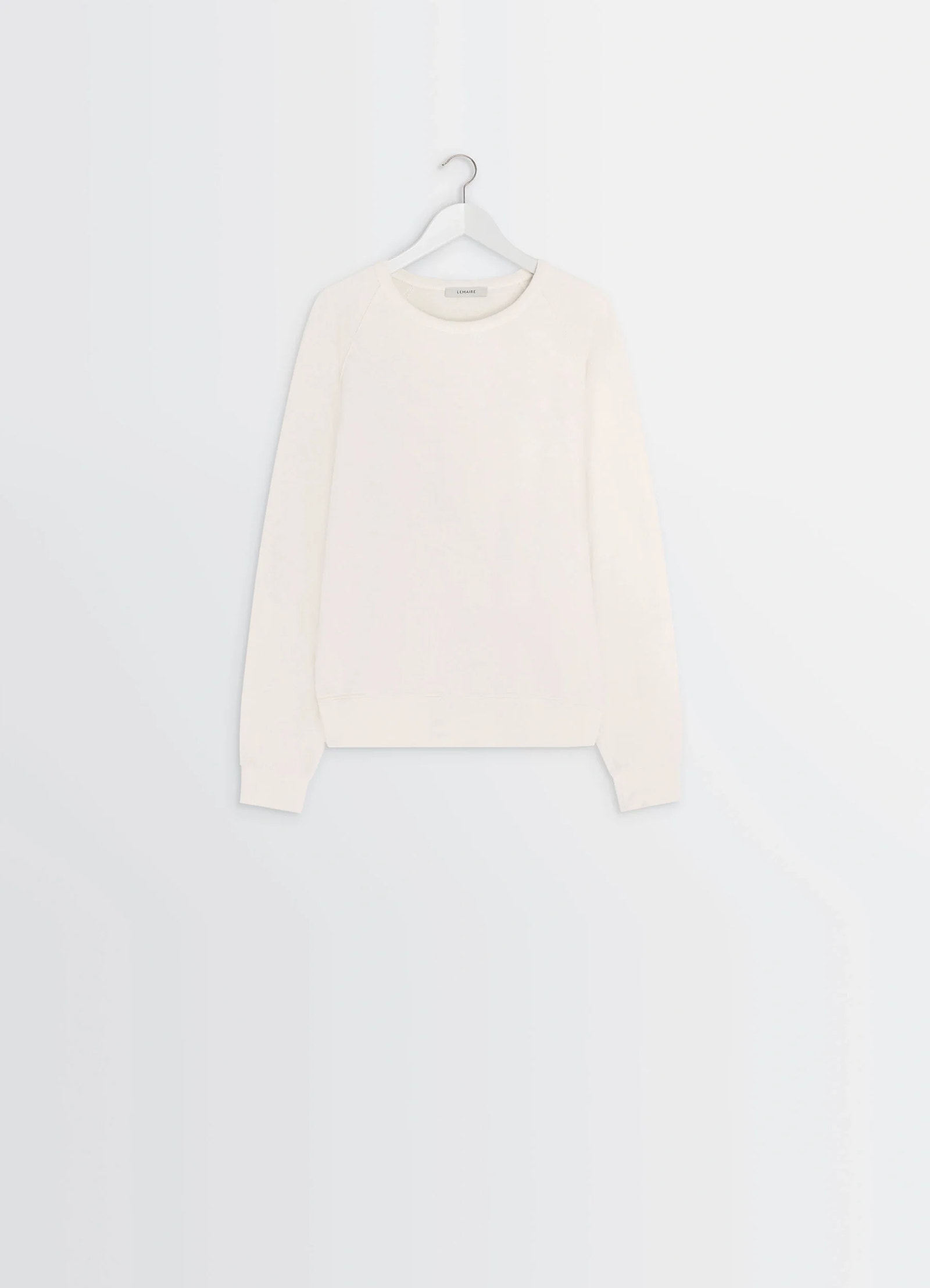 Lemaire crew neck sweatshirt in cotton wool blend beige, product shot, hanging view raglan sleeve seams