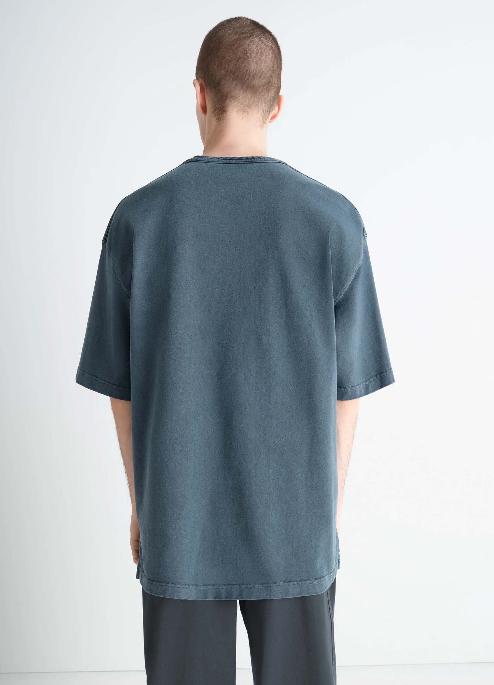 Lemaire short sleeve t-shirt in garment dyed cotton, model shot, back view long hem