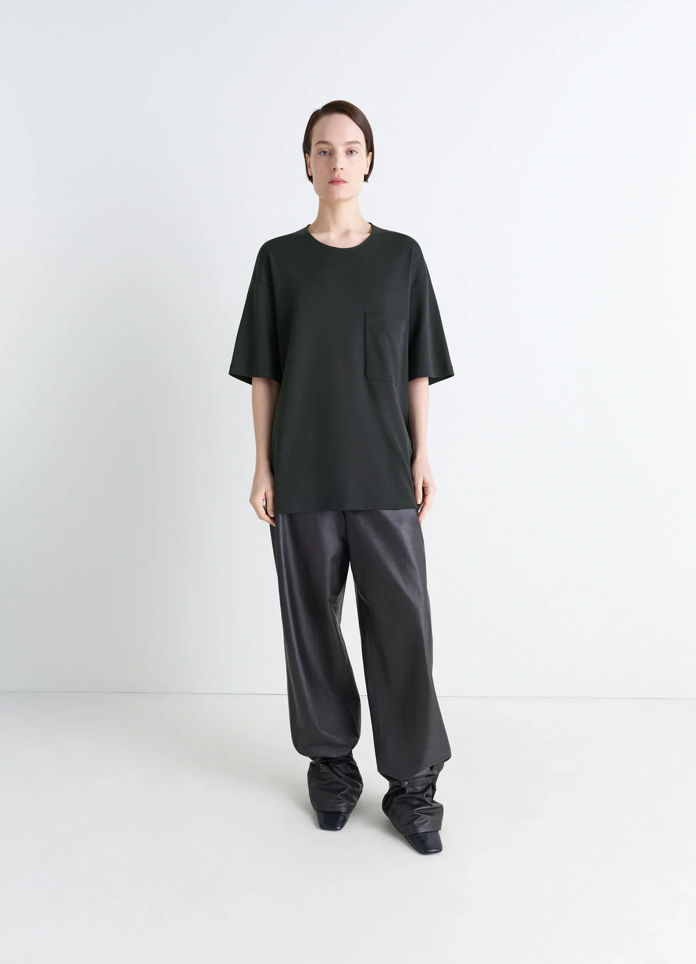 Lemaire Casual Short-Sleeved T-Shir in Black Cotton and Silk-Blend Jersey, model shot, full body front view dropped shoulders