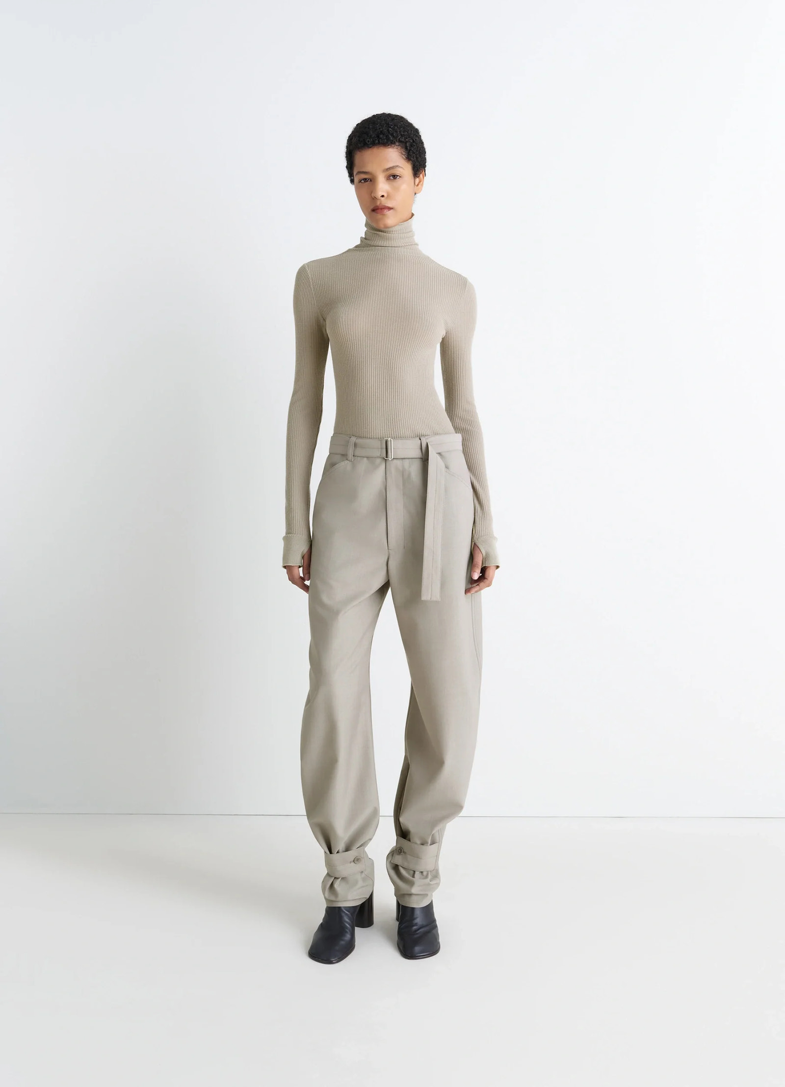 Lemaire seamless short sleeves high in heather ribbed merino wool, model shot, full body front view long sleeves, high neck