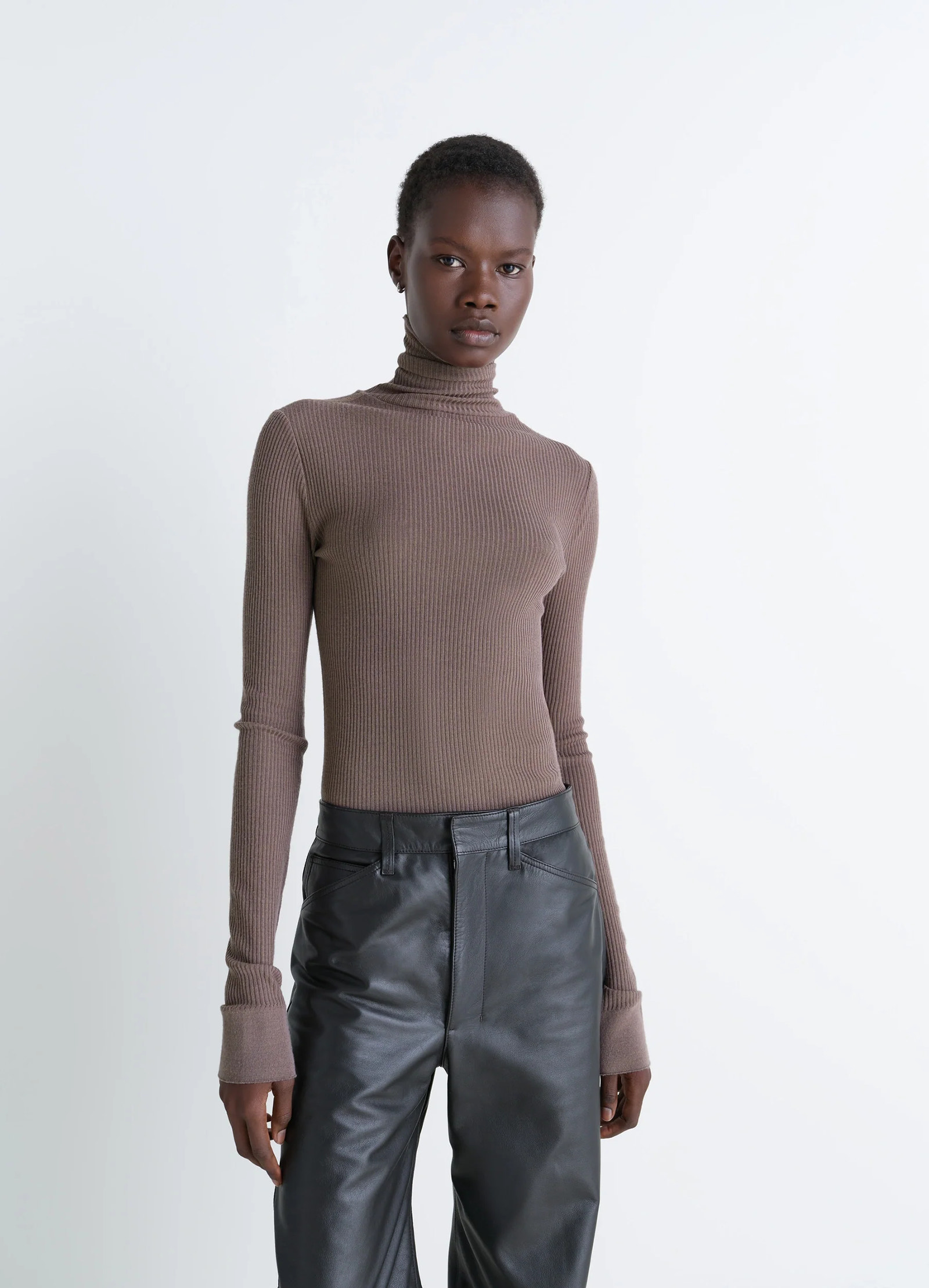 Lemaire seamless high neck top in ribbed merino wool, model shot, front view fitted cut