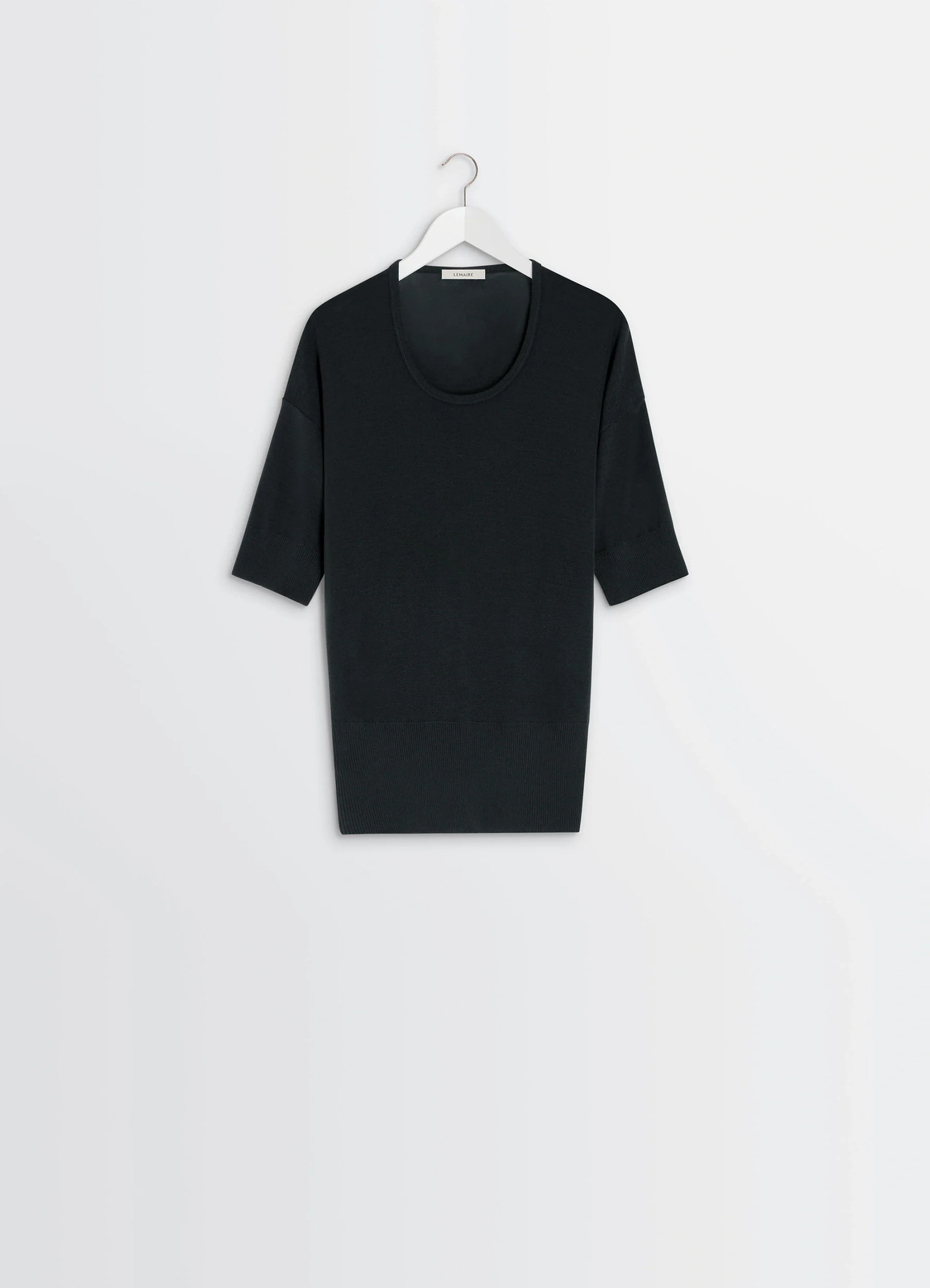 Lemaire short sleeves top in black ribbed merino wool, product shot, hanging front view scoop neckline
