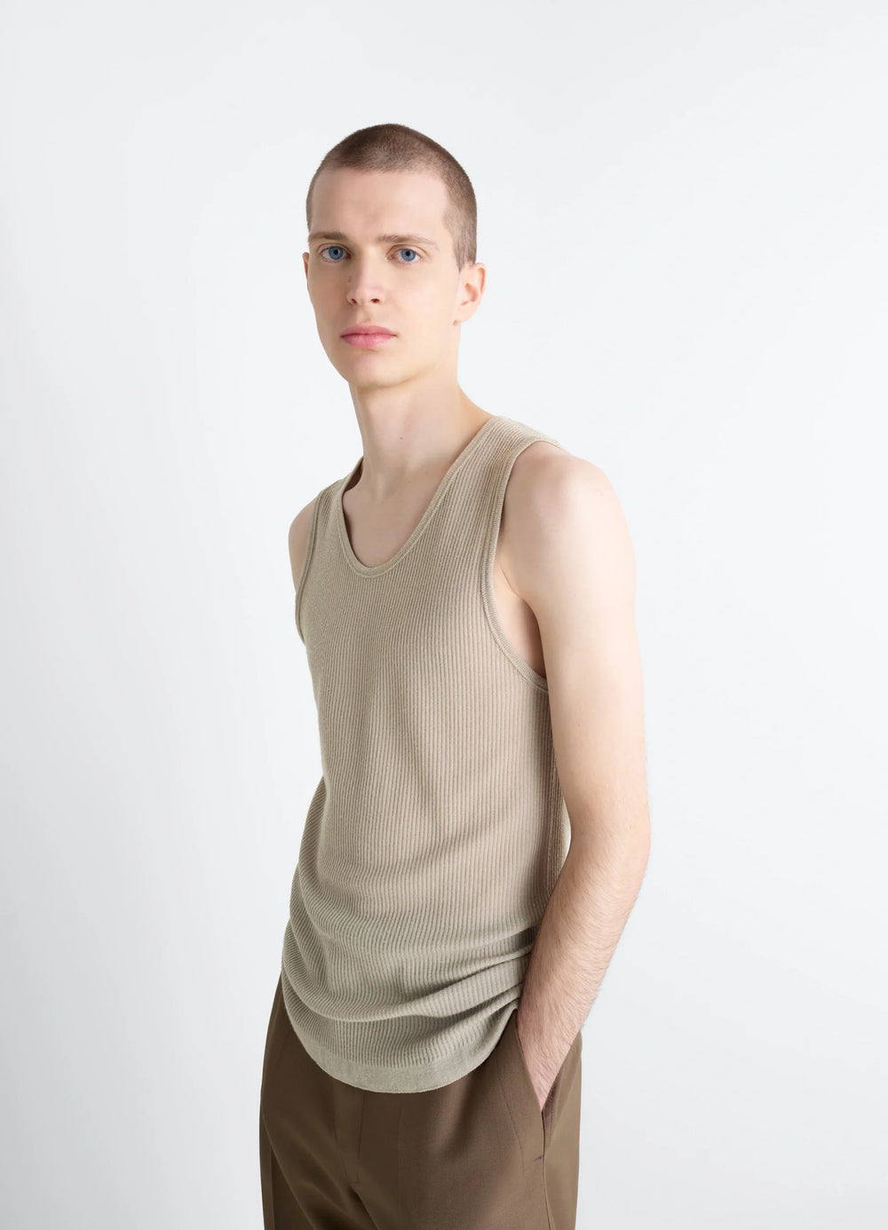 Lemaire Ribbed Merino Tank Top in Fine Ribbed Merino Wool, model shot, three-quarter view sleeveless relaxed fit