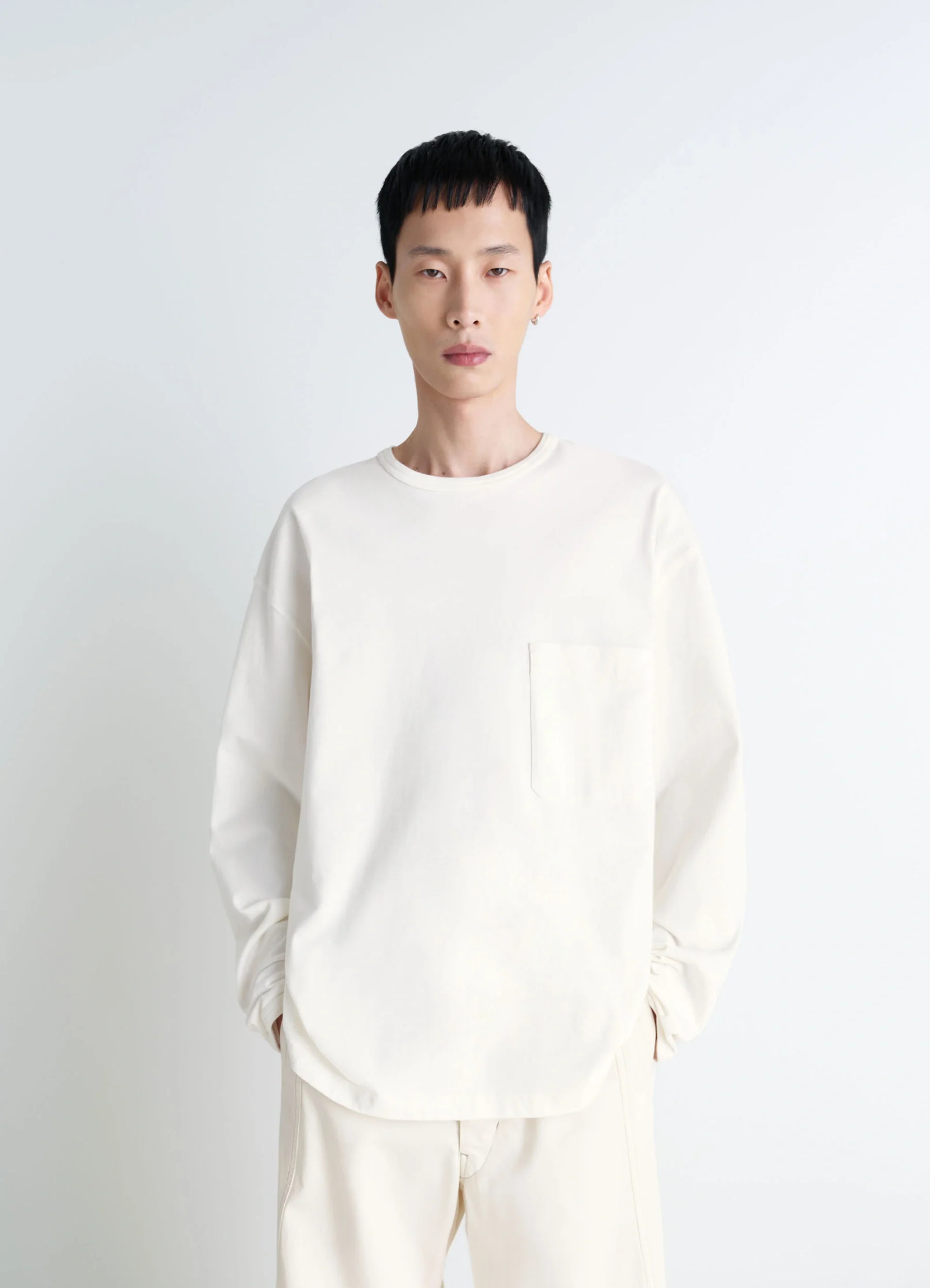 Lemaire long sleeve t-shirt in cotton jersey soft patina, model shot, front view relaxed fit with pocket