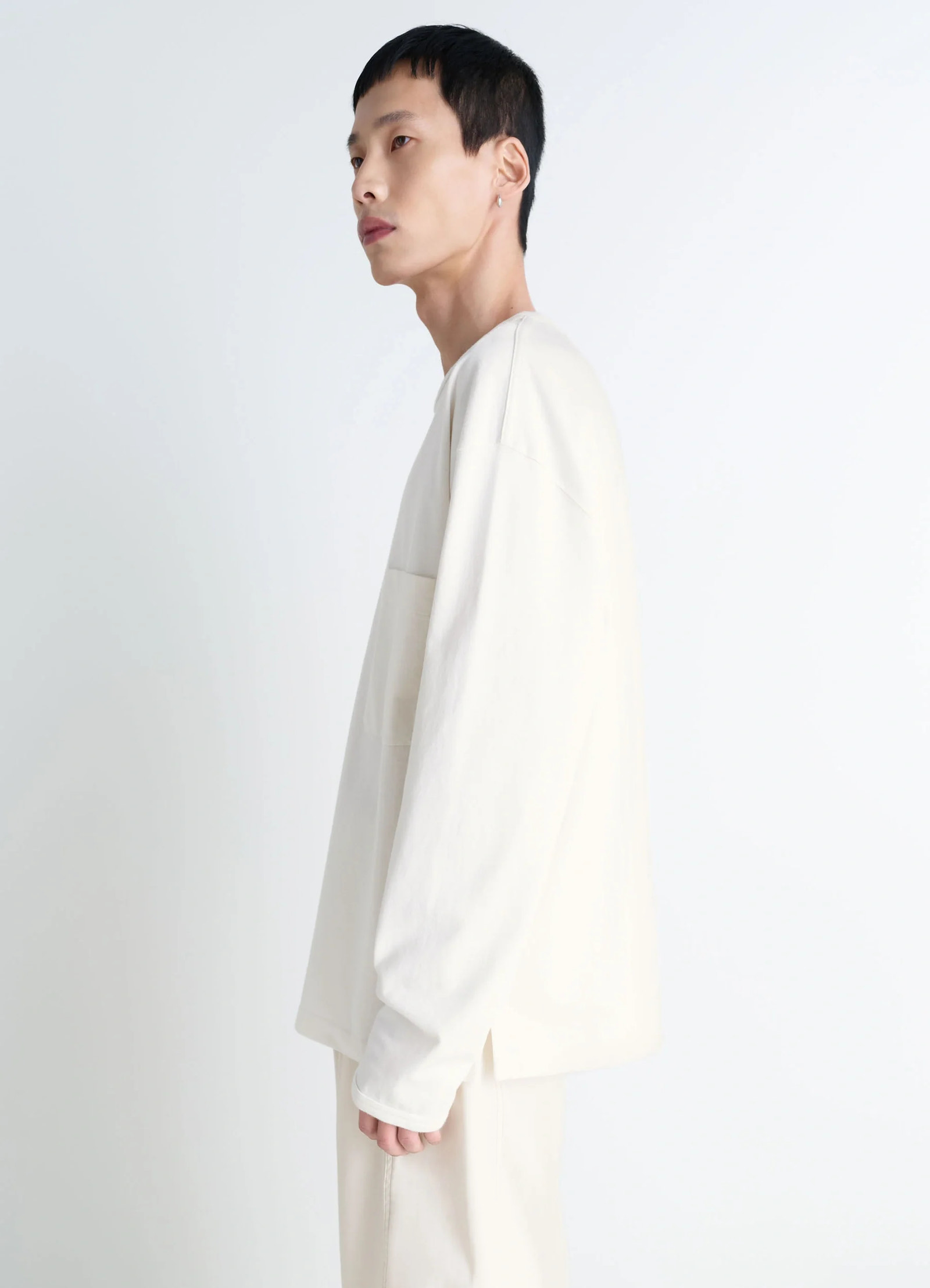 Lemaire long sleeve t-shirt in cotton jersey soft patina, model shot, side view loose fit with side slit