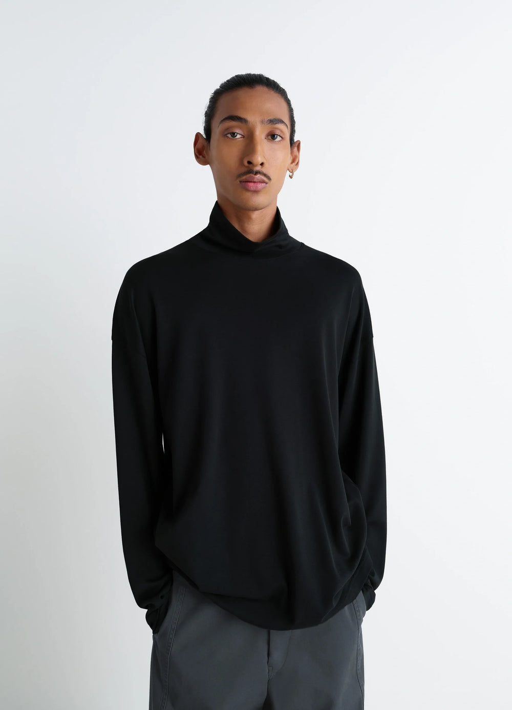Lemaire Relaxed Mock Neck T-Shirt in Black Cotton Silk-Blend, model shot, three-quarter view mock neck worn