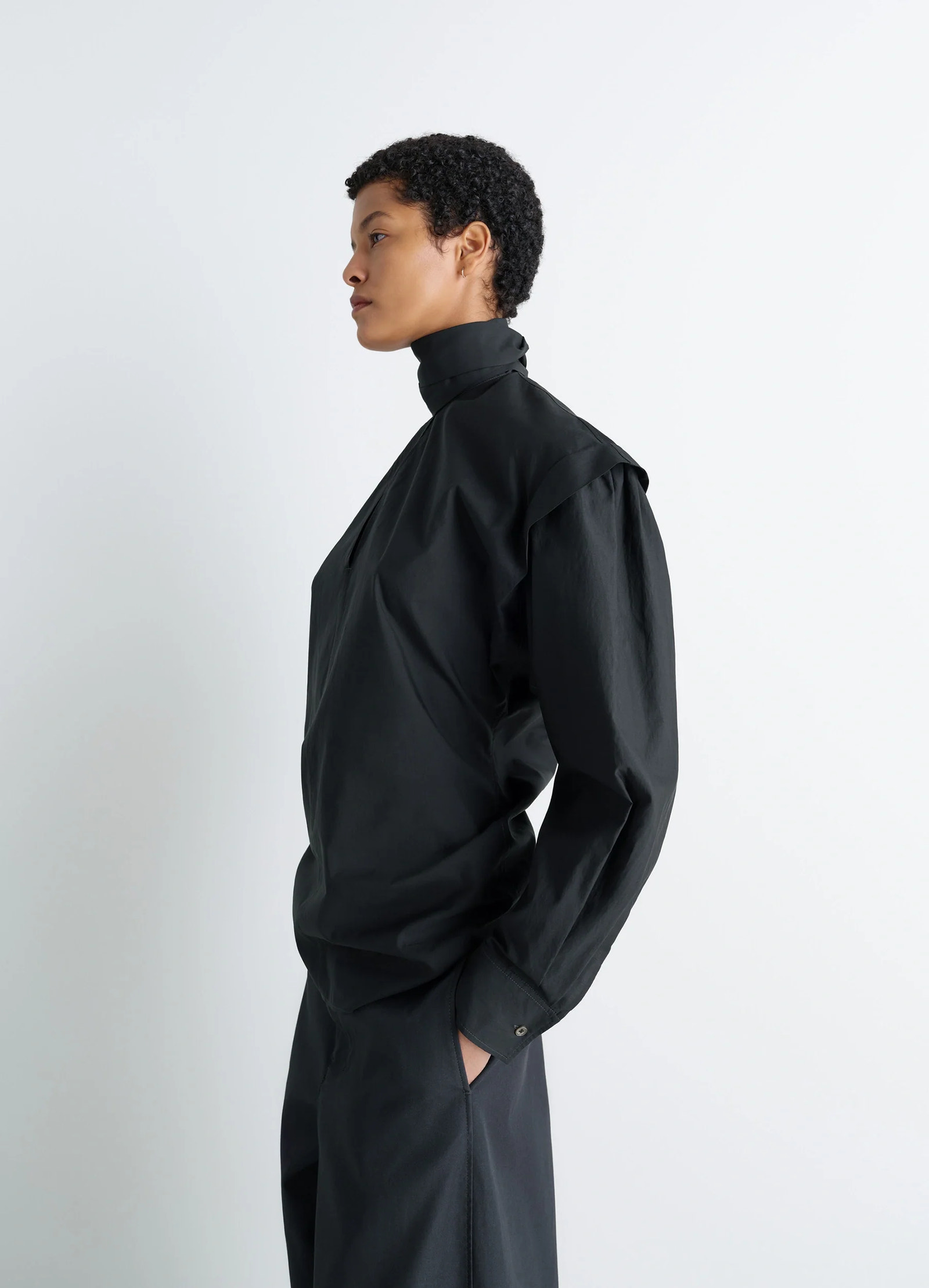 Ascot blouse in washed cotton-silk blend, model shot, side view high neck, gathered shoulder