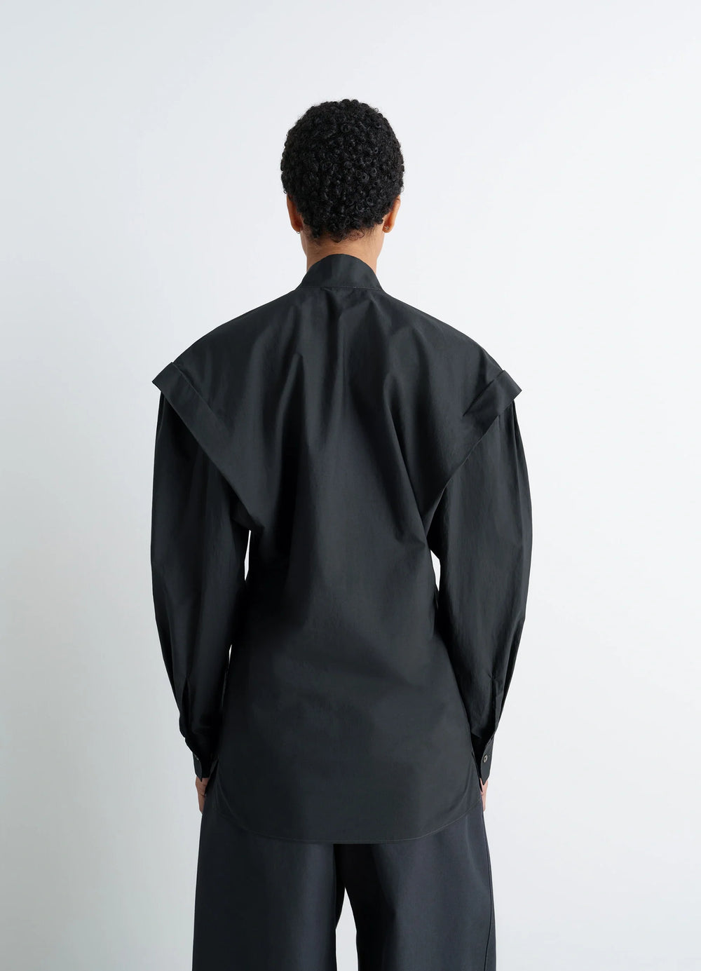 Ascot Blouse in Washed Cotton-Silk Blend, model shot, back view extended yoke, button cuffs