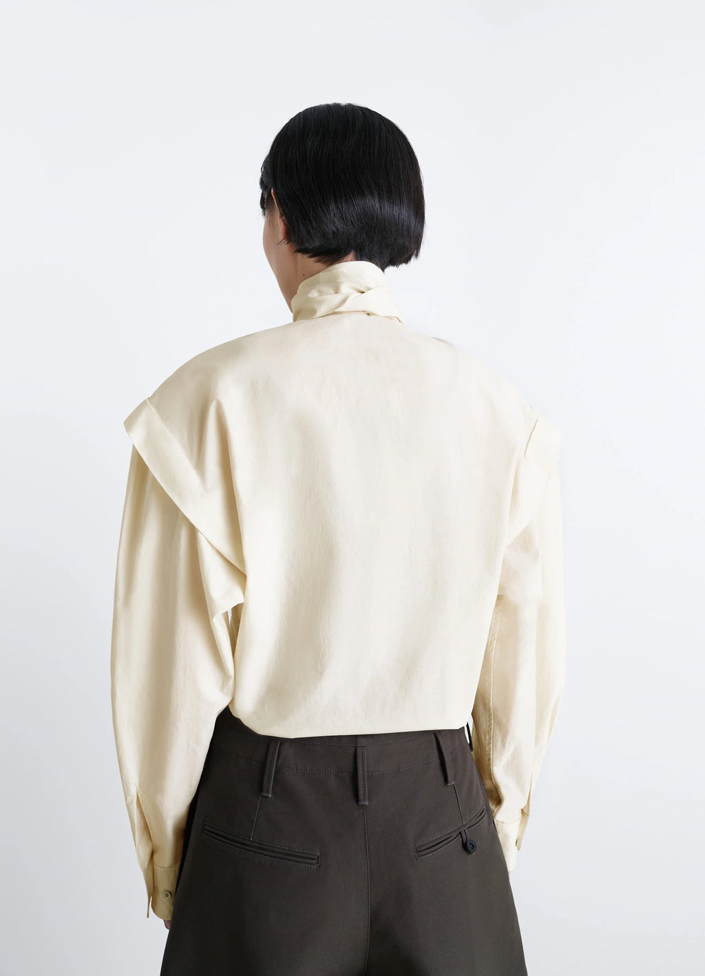 Lemaire Ascot Blouse in Ivory Washed Cotton-Silk, model shot, back view draped back with ascot tie