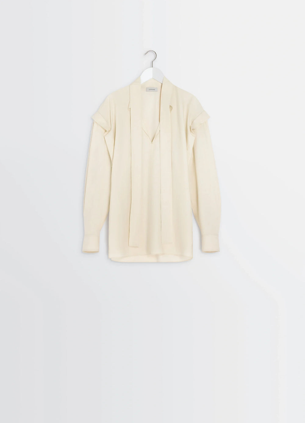 Lemaire Ascot Blouse in Ivory Washed Cotton-Silk, product shot, hanging packshot view ascot tie draped front