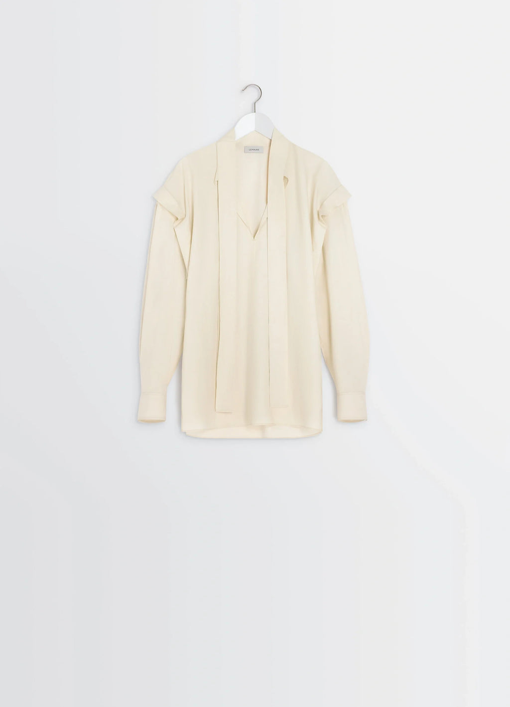 Lemaire Ascot Blouse in Ivory Washed Cotton-Silk, product shot, hanging packshot view ascot tie draped front