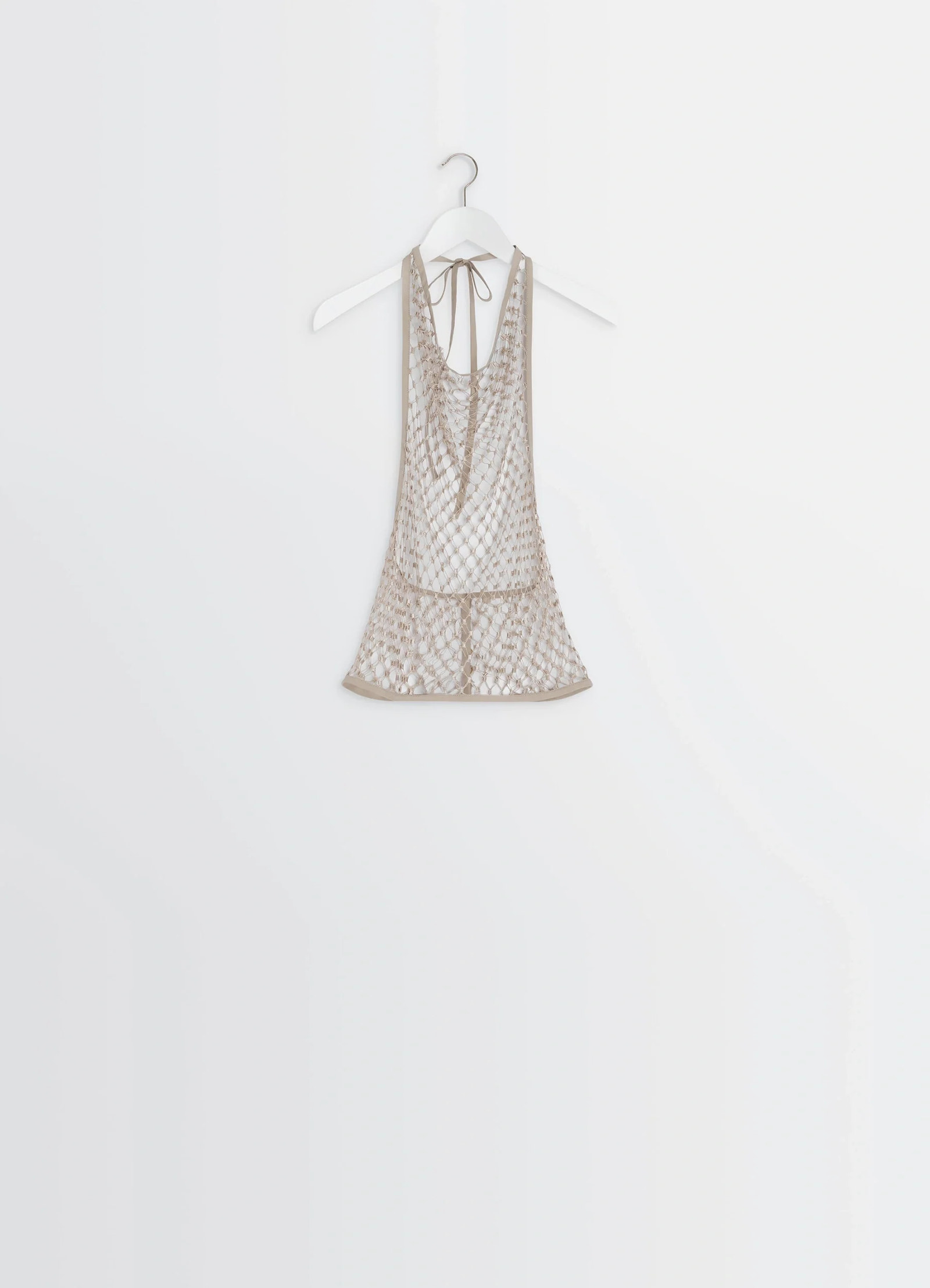 Lemaire fishnet halter top in cream fishnet, product shot, back view hanging display