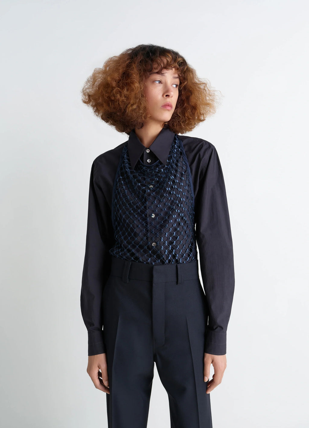 Fishnet Halter Top in Dark Blue Fishnet, model shot, front side view layered over shirt