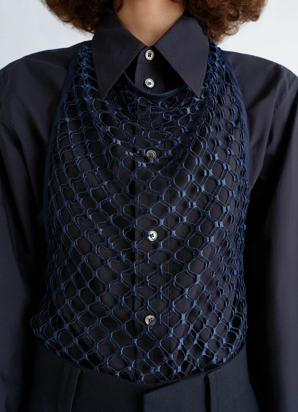 Fishnet Halter Top in Dark Blue Fishnet, model shot, close-up view layered over button-up