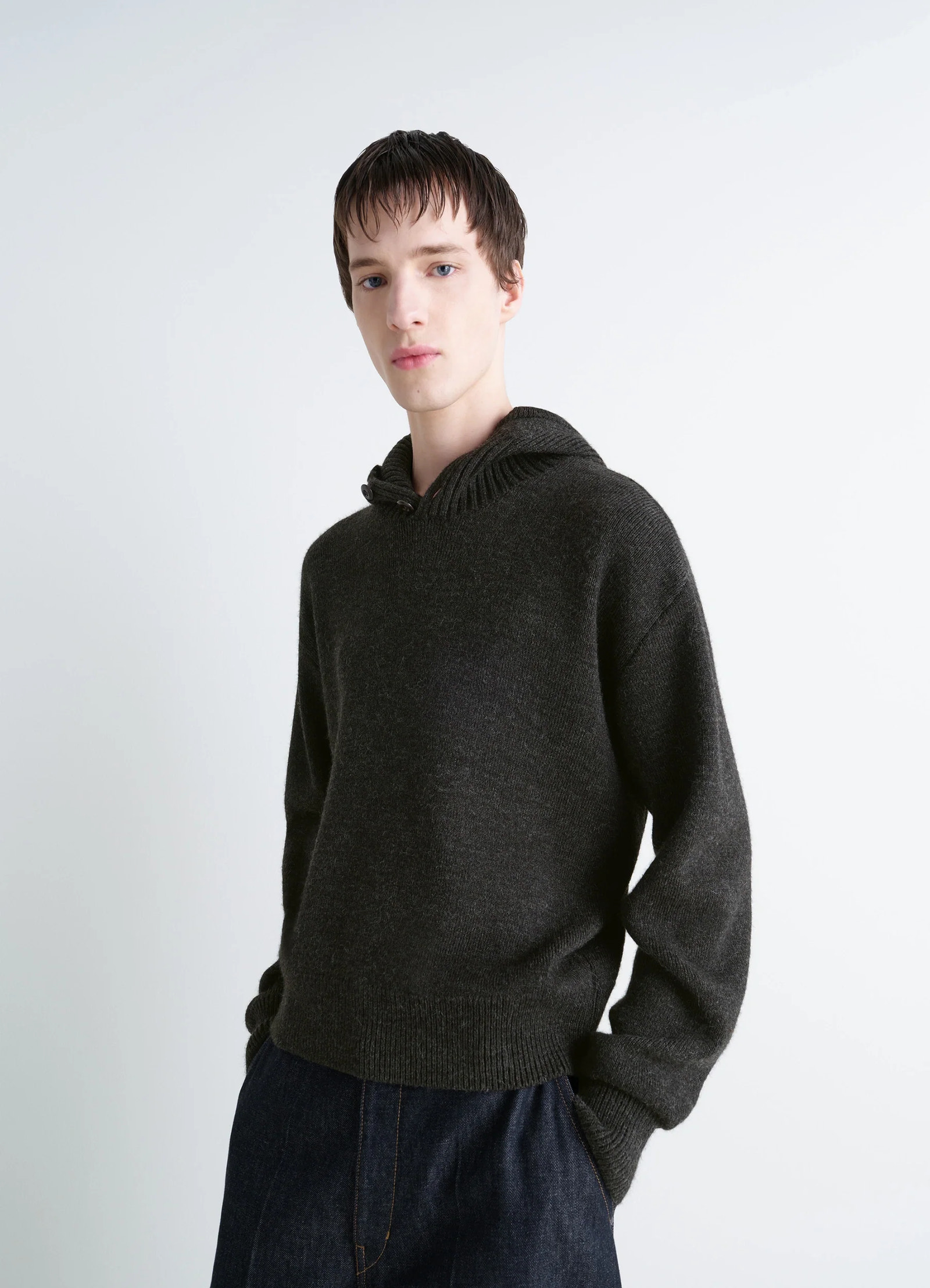 Lemaire hooded sweater in dark wool and alpaca, model shot, front view relaxed fit with hood