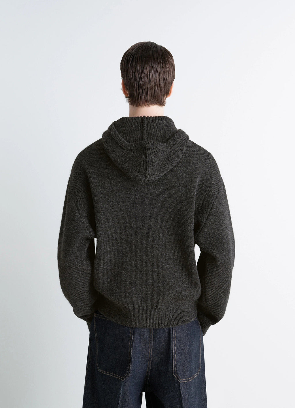 Lemaire Hooded Sweater in Dark Wool and Alpaca, model shot, back view dropped shoulder design