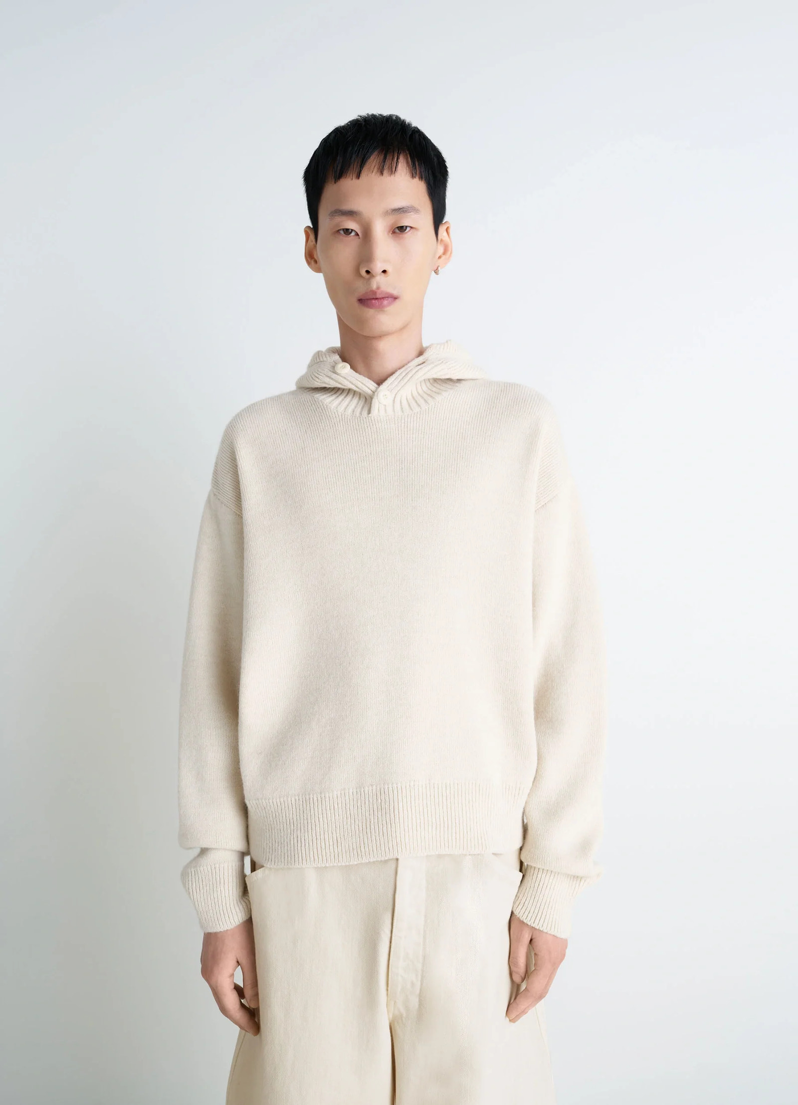 Lemaire hooded sweater in cream wool alpaca, model shot, front view button-down relaxed fit