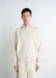 Lemaire Hooded Sweater in Cream Wool Alpaca, model shot, Front view Button-down relaxed fit