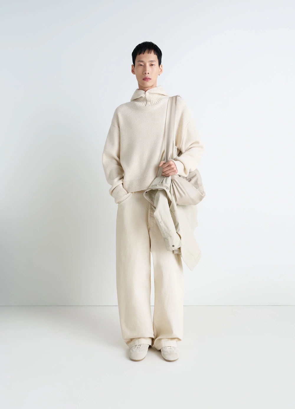 Lemaire Hooded Sweater in Cream Wool Alpaca, model shot, side view loose fit with hood