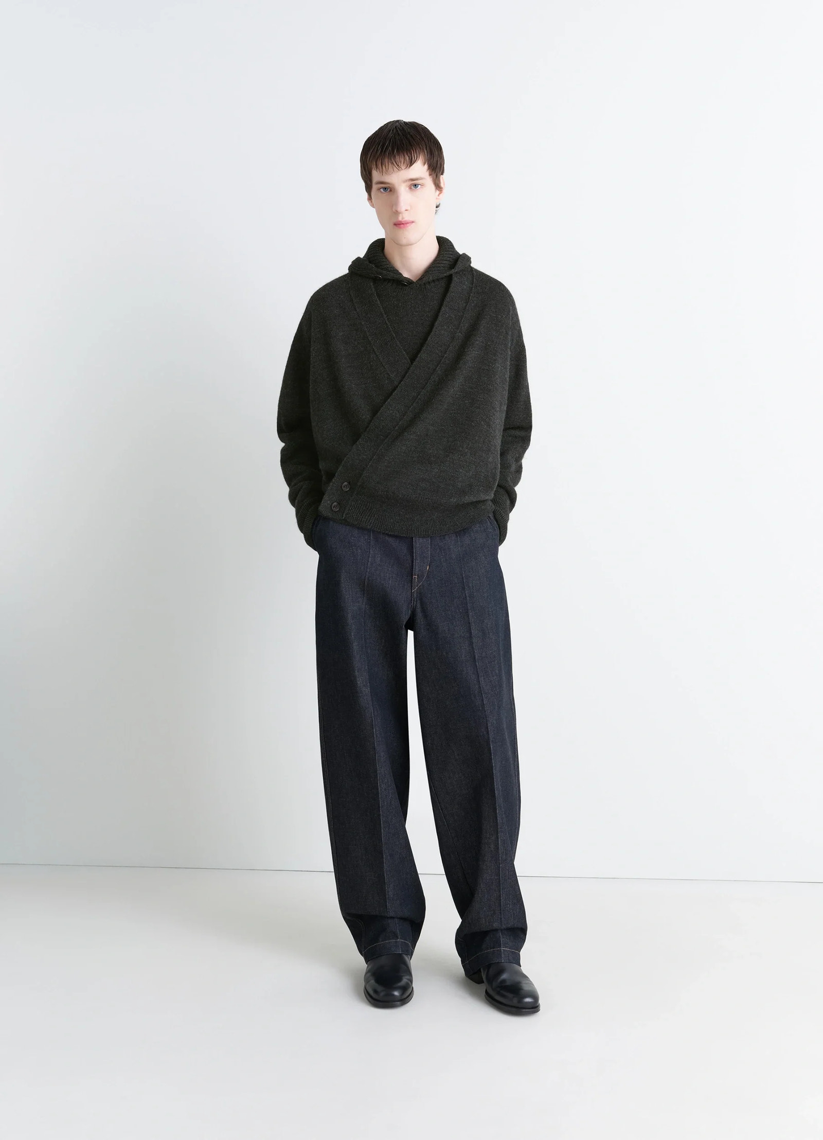 Lemaire wrap cardigan in dark wool alpaca blend, model shot, full front view oversized fit with ribbed cuffs