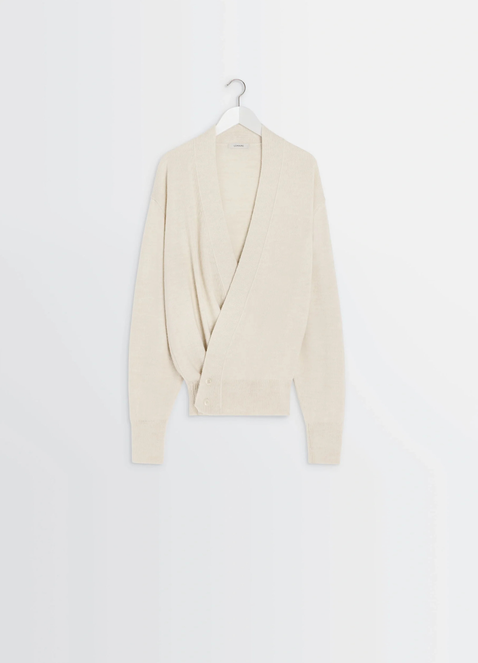 Lemaire wrap cardigan in ivory wool alpaca, product shot, hanging front view single-button closure visible