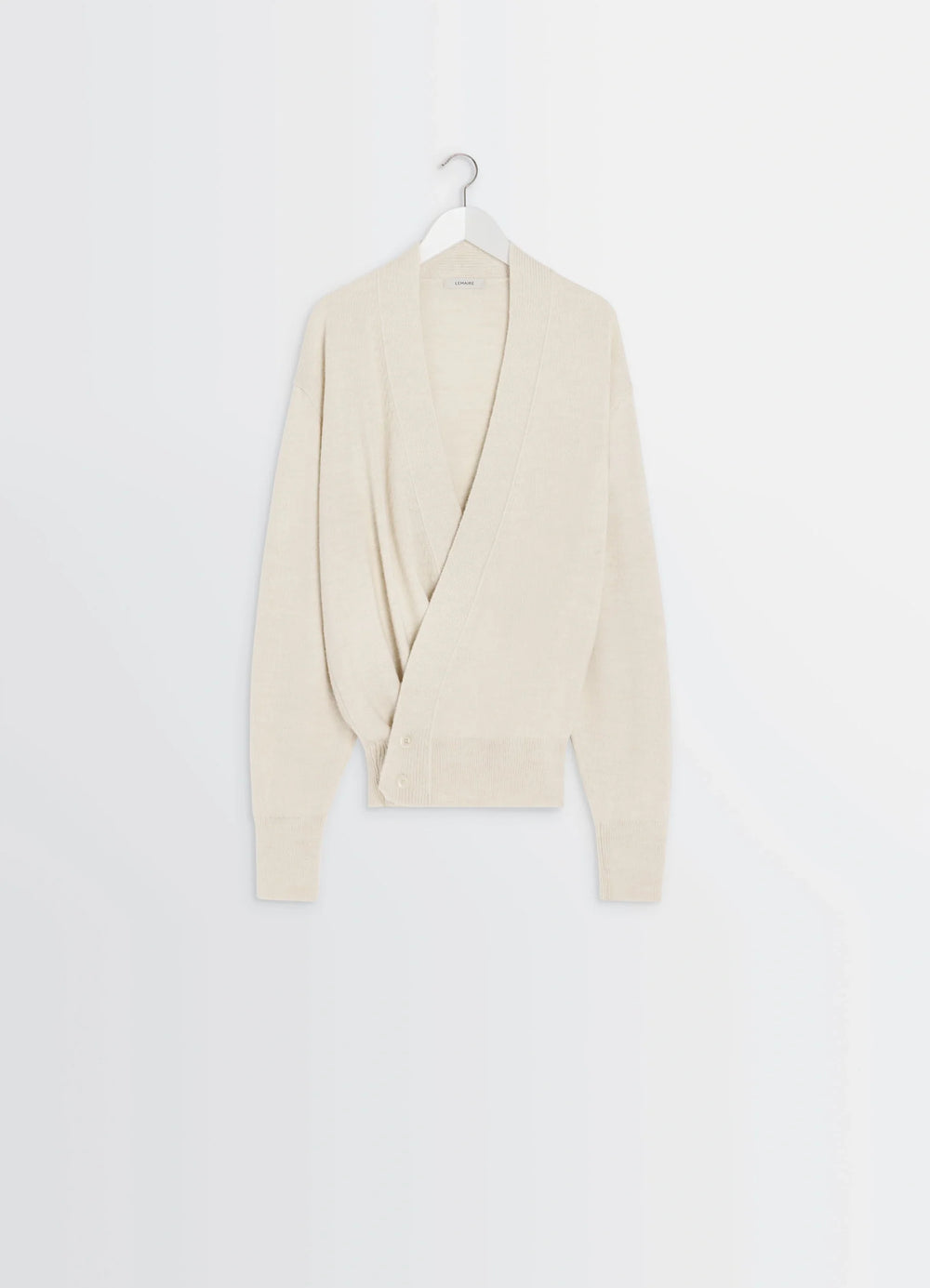 Lemaire Wrap Cardigan in Ivory Wool Alpaca, product shot, hanging front view single-button closure visible