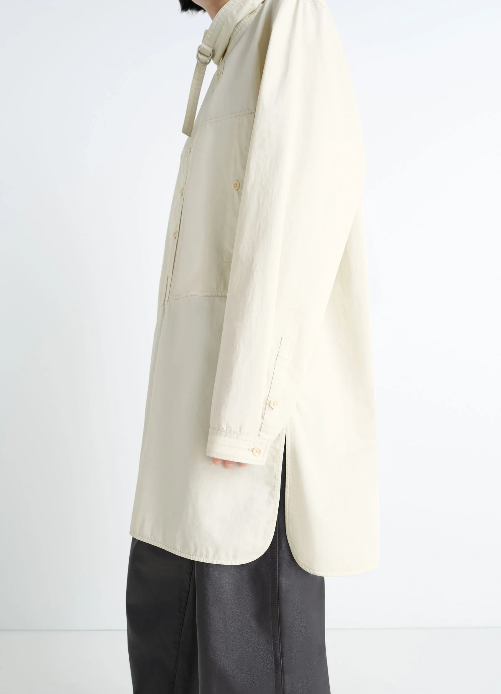 Lemaire chest pocket long liquette in lightweight satin cotton, model shot, side view high side slit shown