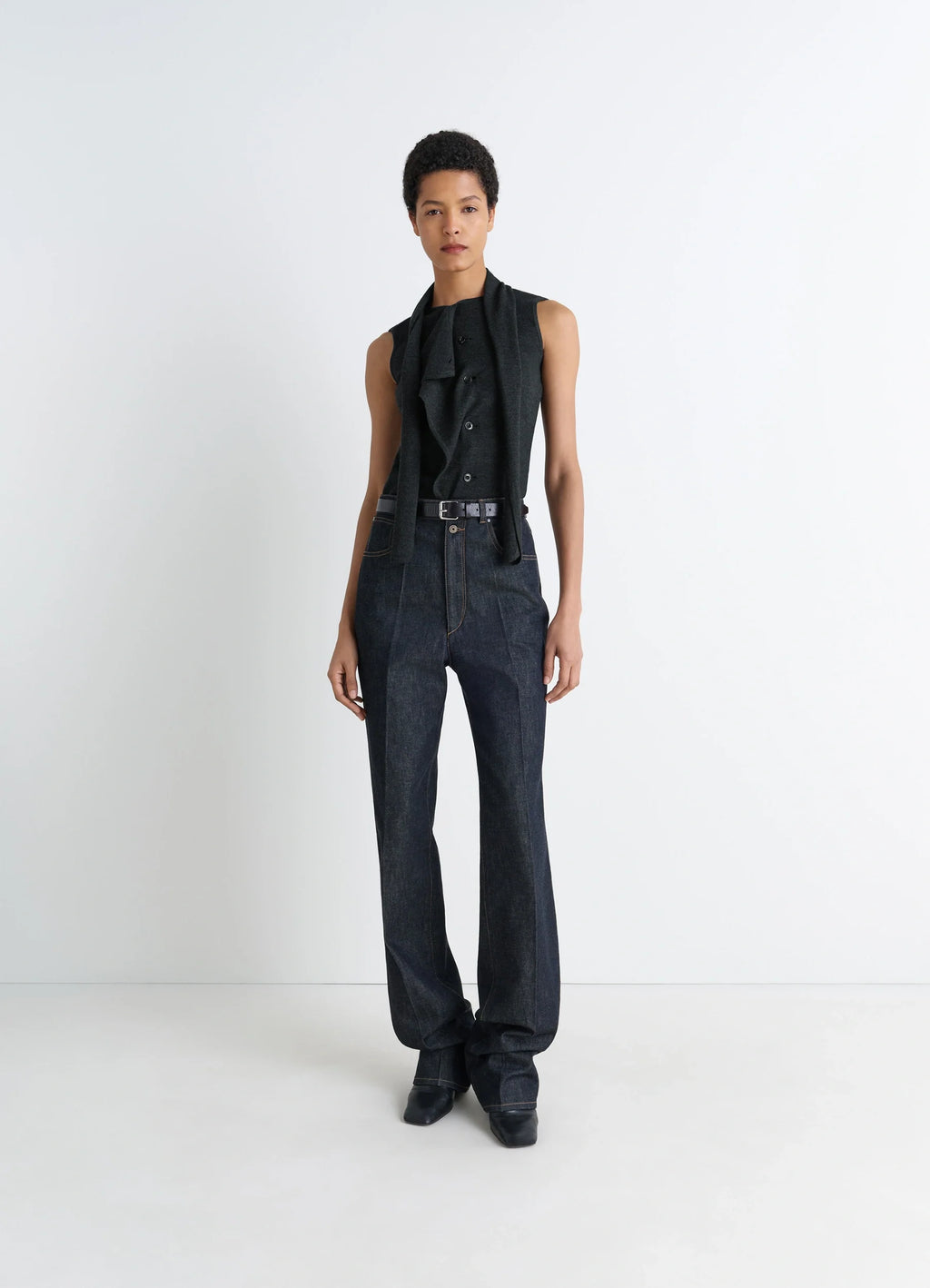 Lemaire Asymmetrical Sleeveless Car in Blended Merino Wool, model shot, full body side view asymmetrical drape, sleeveless