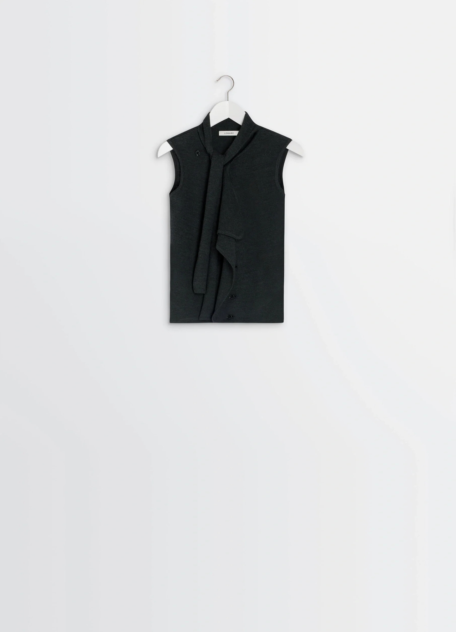 Lemaire asymmetrical sleeveless car in blended merino wool, product shot, hanging view buttoned draped