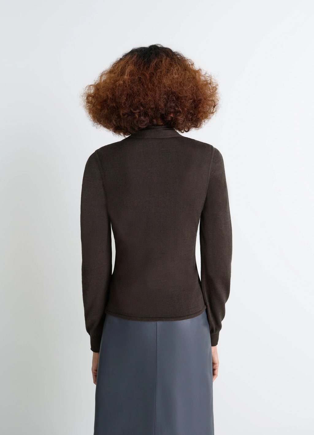 Lemaire Asymmetrical Sleeveless Car in Blended Merino Wool, model shot, back view long sleeves with fitted cut