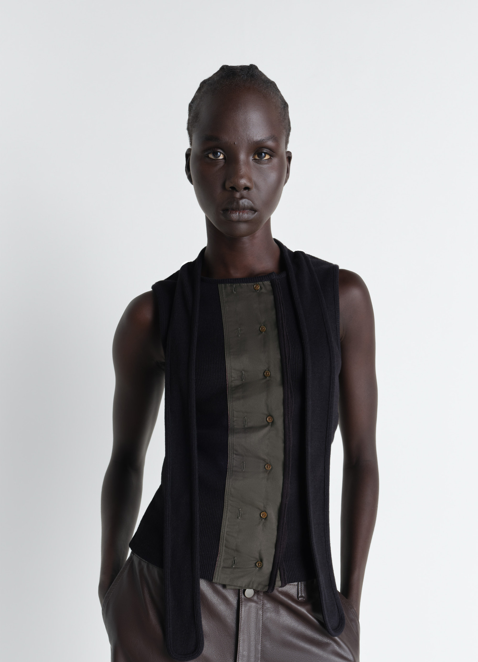 Asymmetrical fitted top in cotton lined rib jersey, model shot, front view sleeveless, integrated scarf