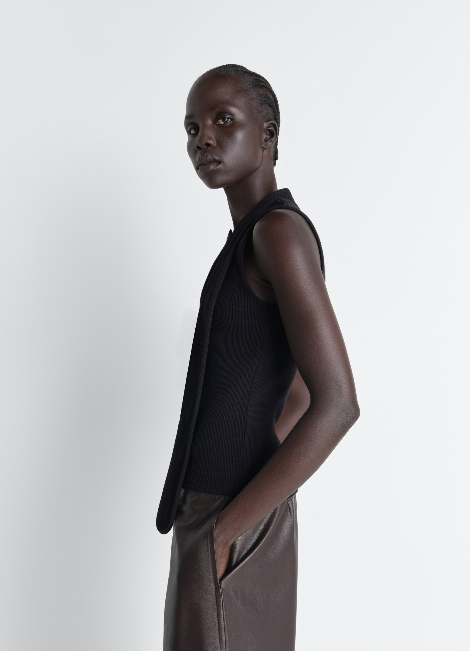 Asymmetrical fitted top in cotton lined rib jersey, model shot, three-quarter view asymmetrical hem