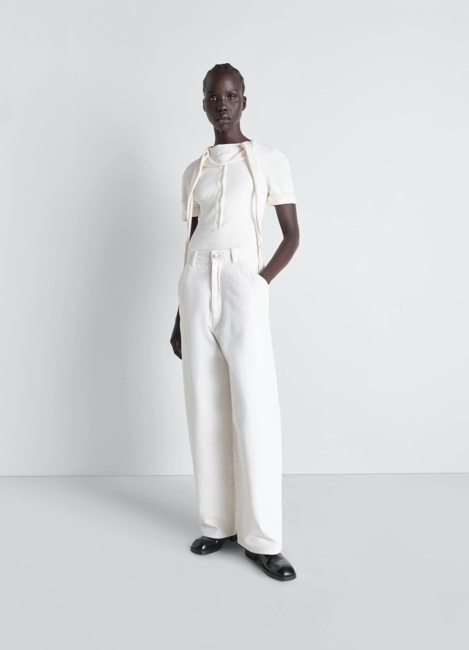 Fitted henley in jersey in cotton linen rib jersey, model shot, side view short sleeve henley