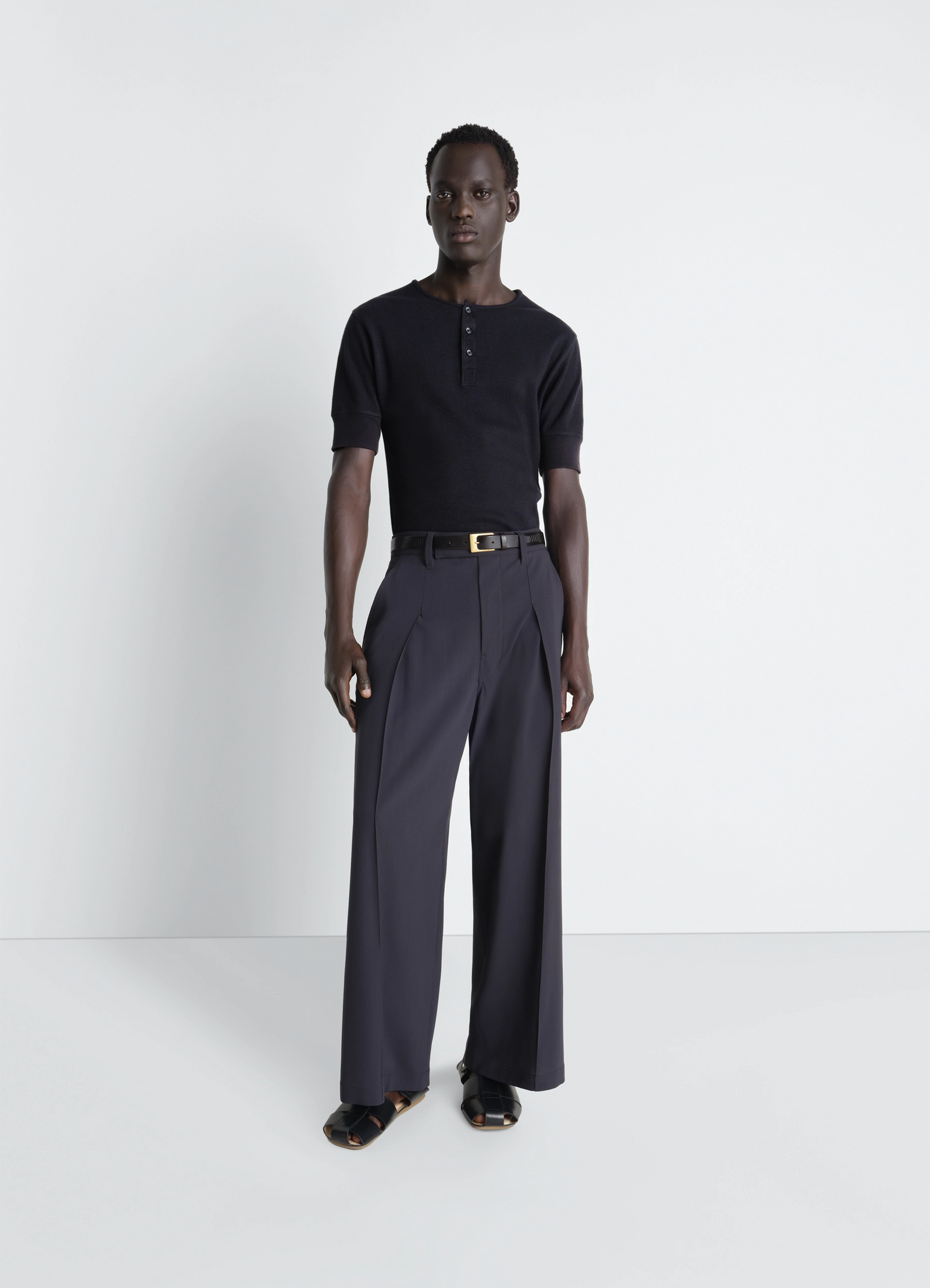 Lemaire rib henley top in ribbed cotton and linen jersey, model shot, three-quarter view ribbed texture