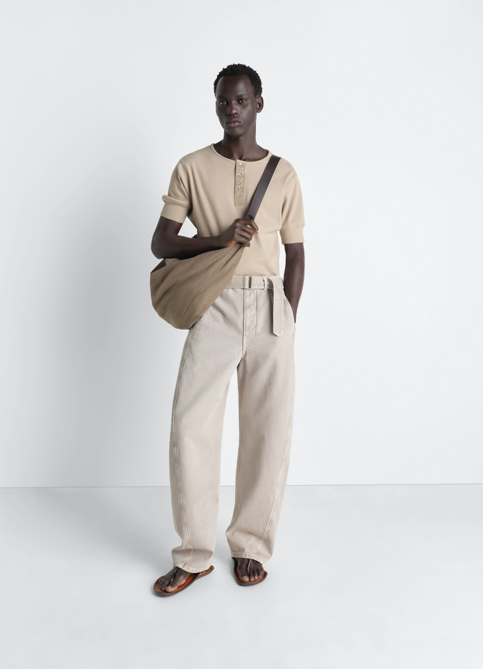 Lemaire rib henley top in beige ribbed cotton linen, model shot, three-quarter view henley neckline