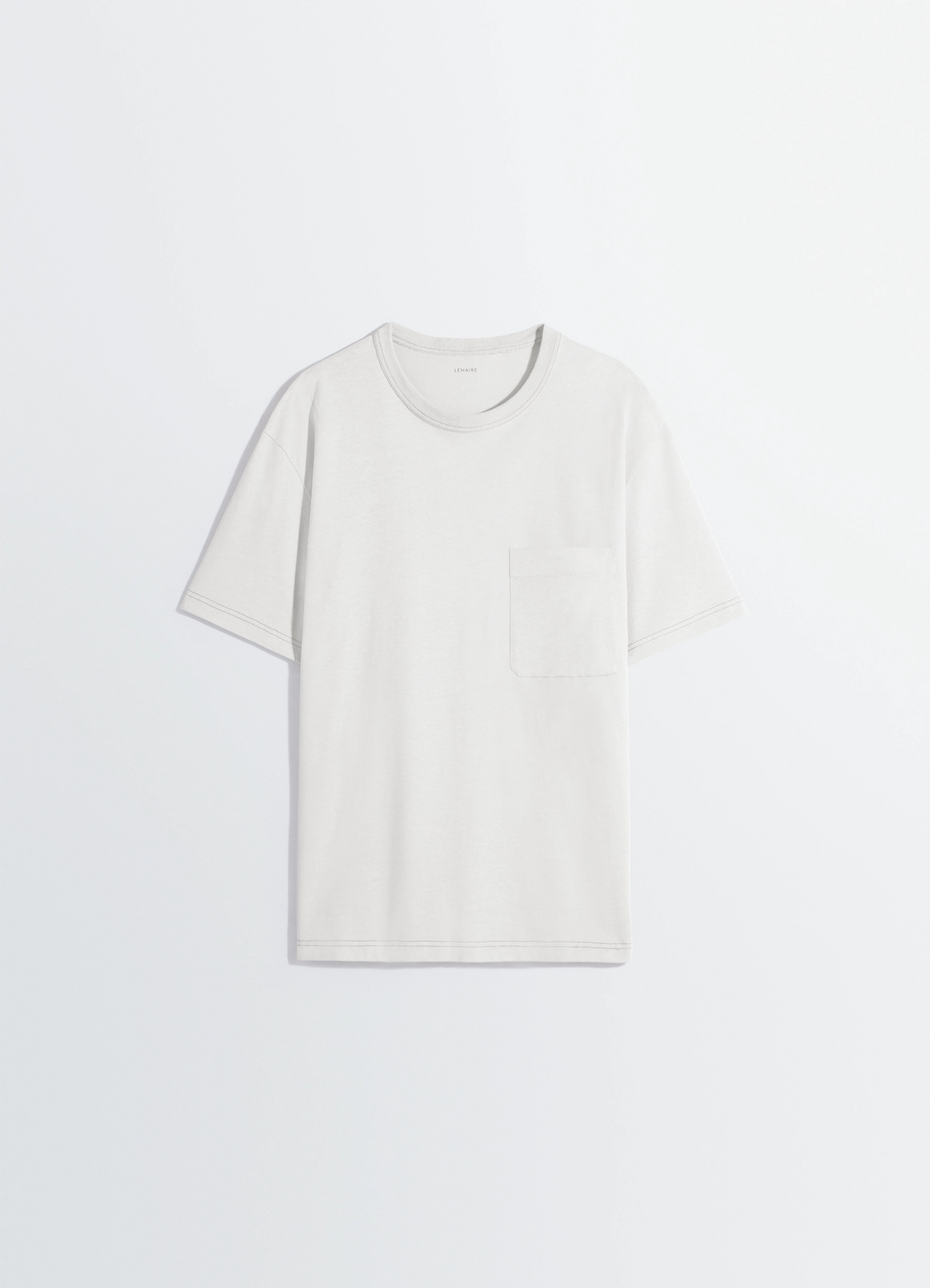 Lemaire boxy short sleeve t-shirt in linen cotton jersey, product shot, side view round neck hem detail