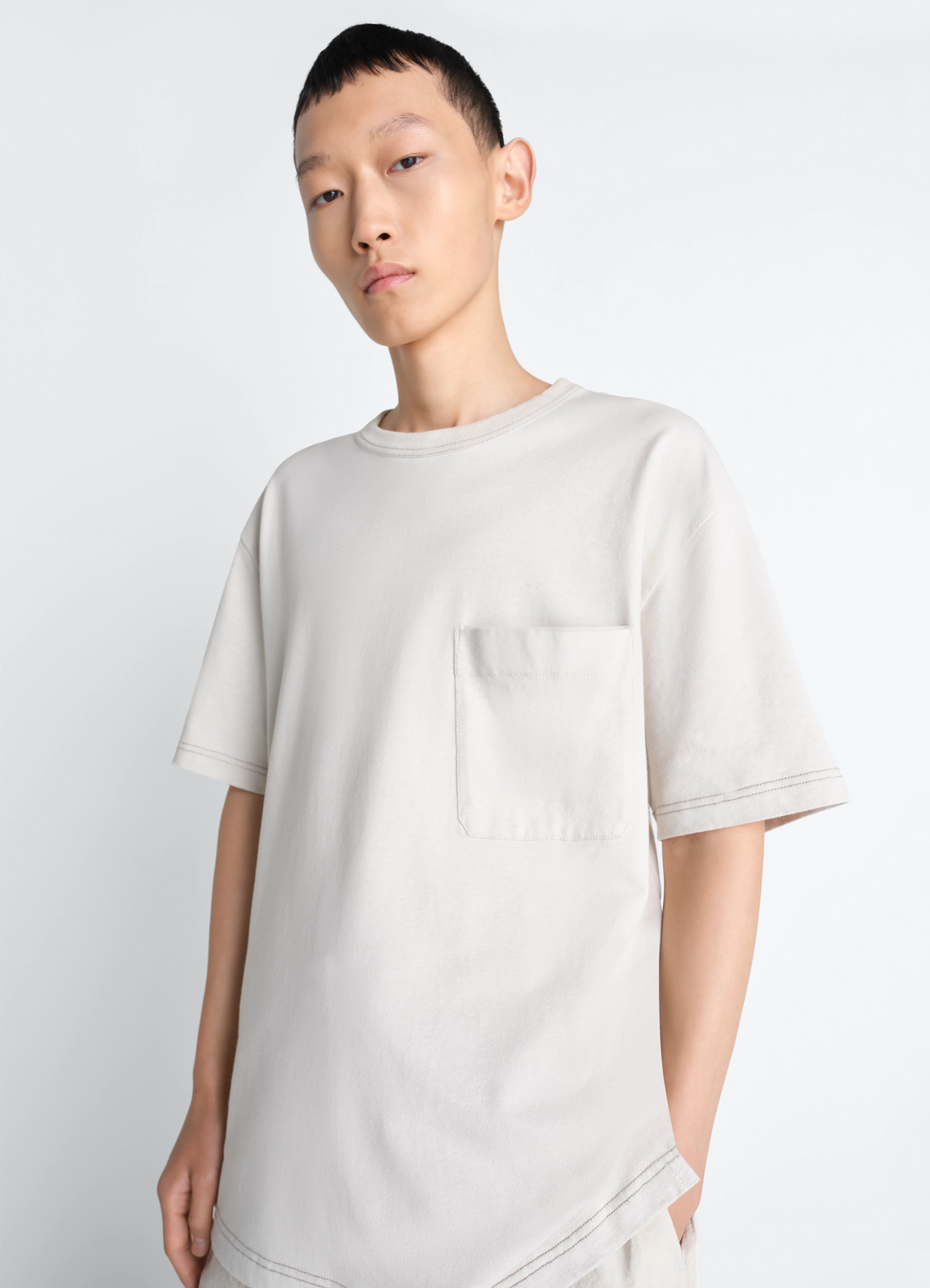 Lemaire Boxy Short Sleeve T-Shirt in Linen Cotton Jersey, model shot, Front view Chest patch pocket