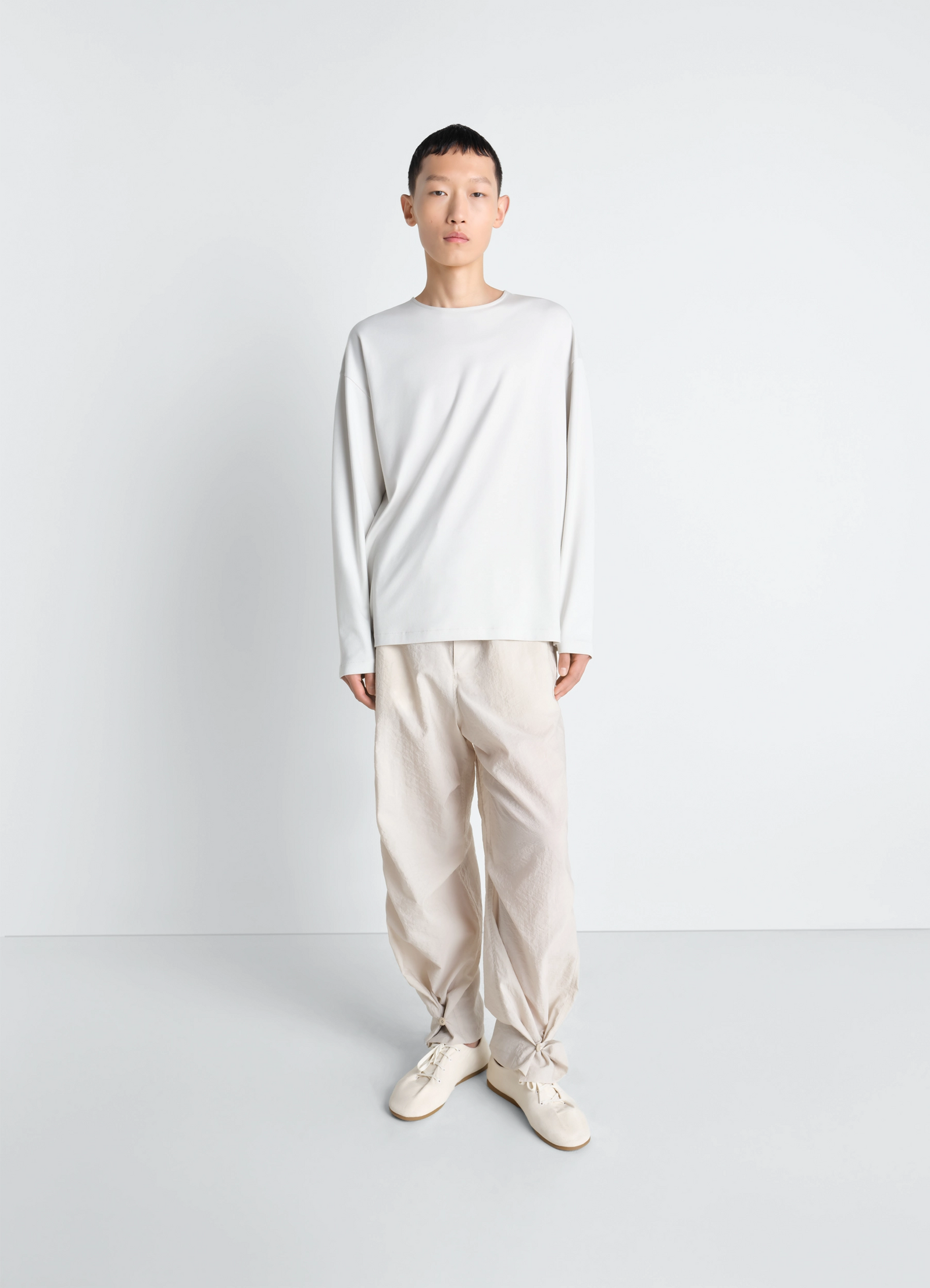 Lemaire long-sleeved t-shirt in cotton silk, model shot, full front view loose hemline