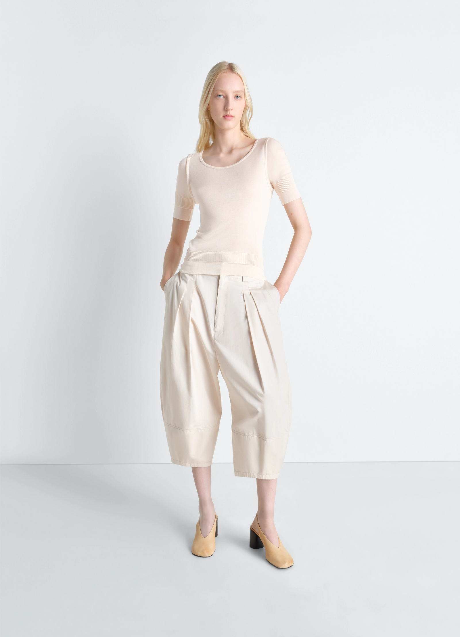 Seamless trompe loeil top in viscose silk, model shot, side view short sleeves