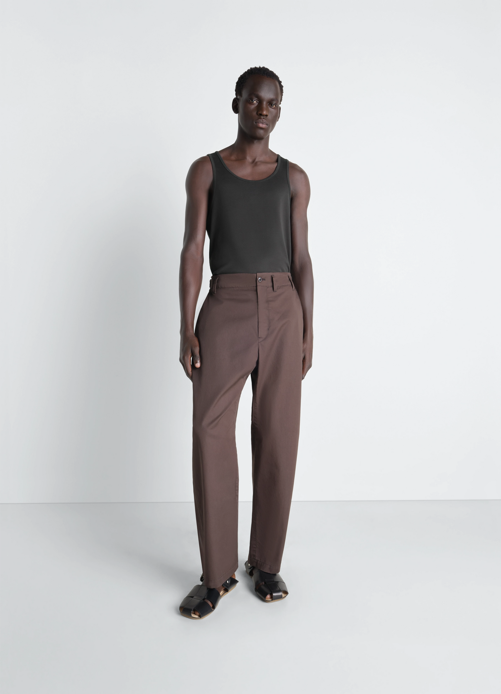 Lemaire tank top in jersey in black mid-weight cotton, model shot, three-quarter view relaxed fit, sleeveless