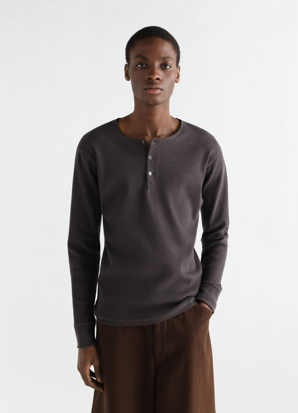 Long-sleeve charcoal linen cotton ribbed Henley t-shirt worn by model front view LEMAIRE