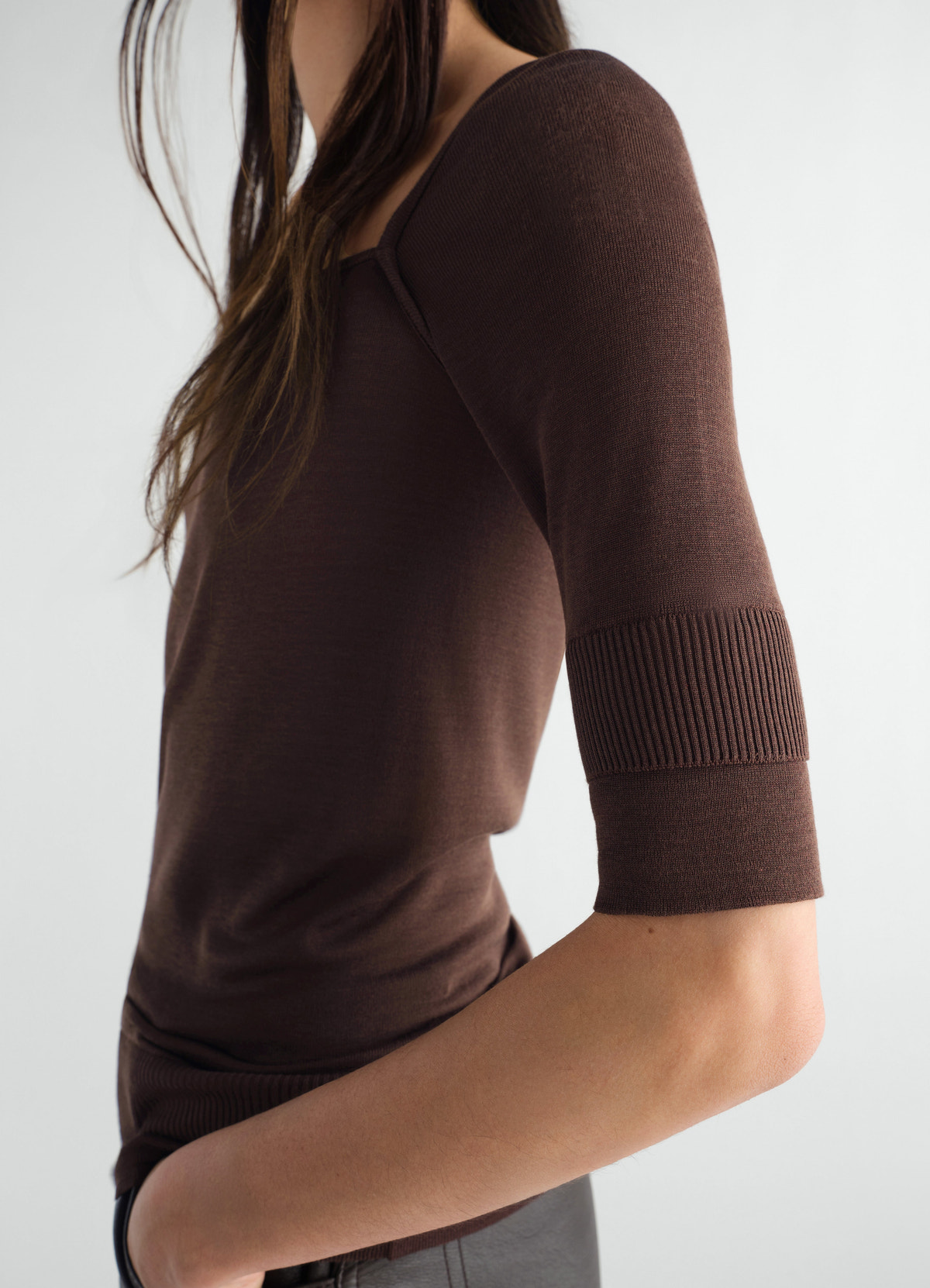 Three-quarter sleeve brown silk viscose top by lemaire worn by model side view close-up detail