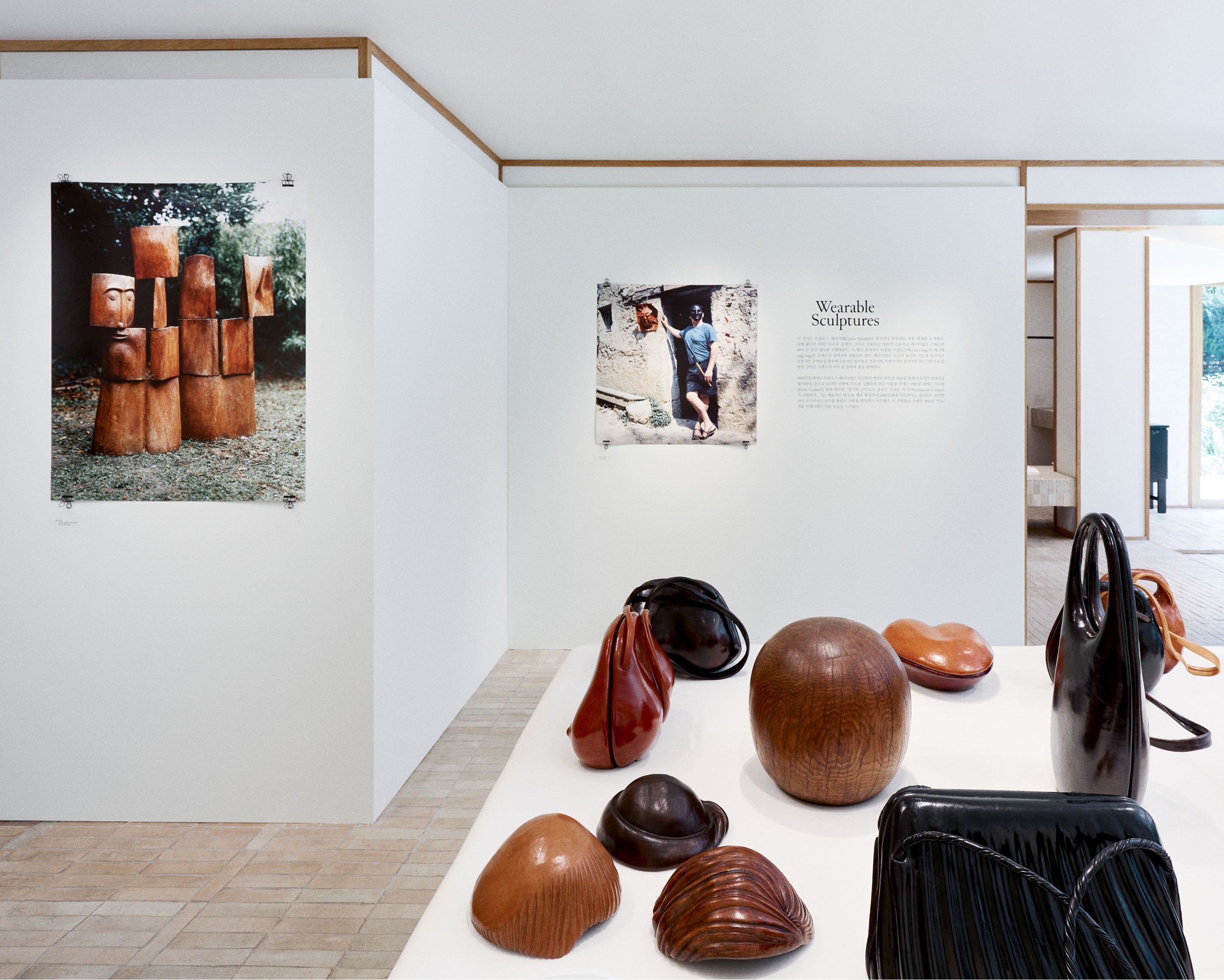Sculptural handbags in Brown and black leather, Front view Unique artistic shapes