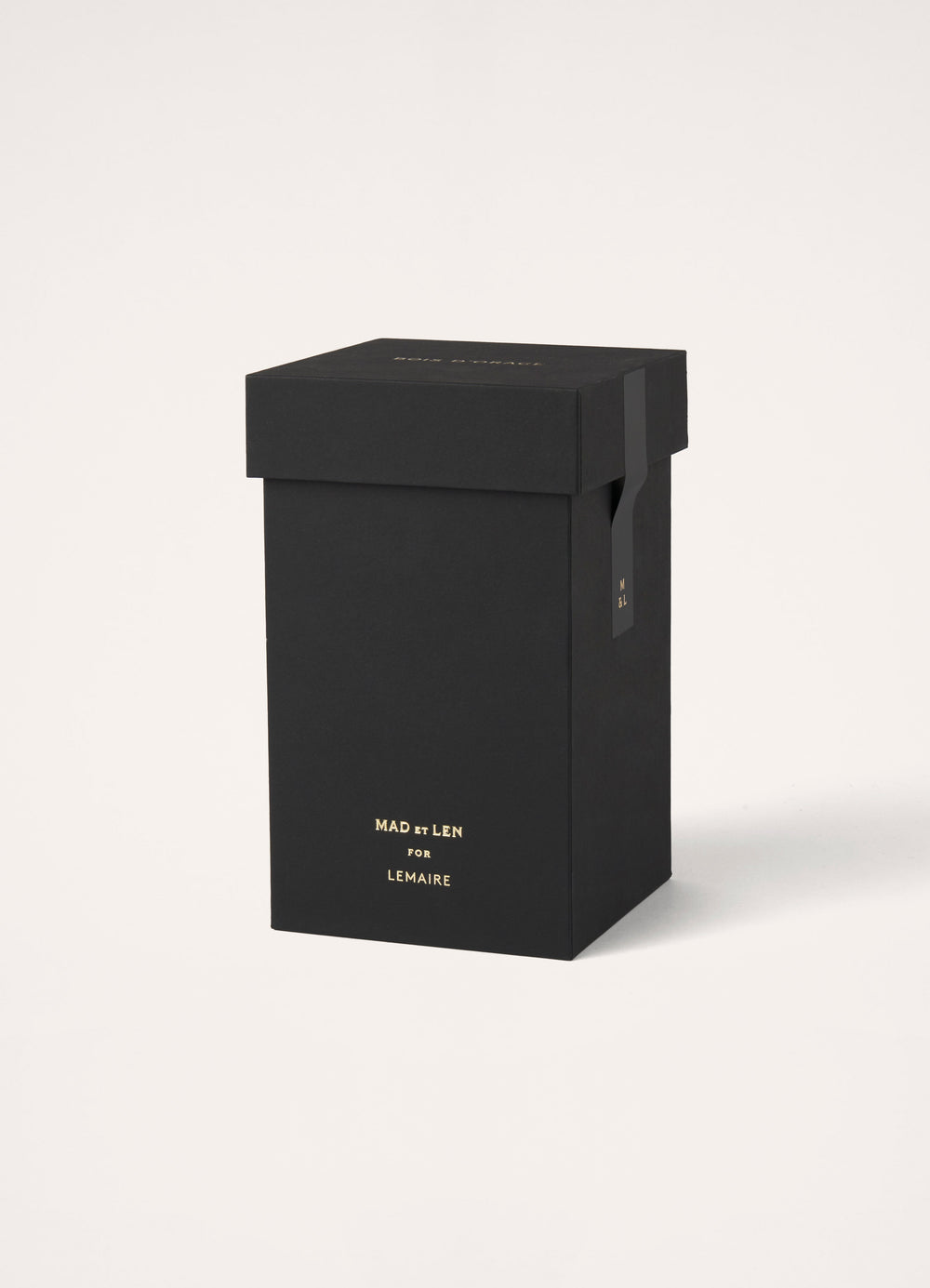 BOIS D’ORAGE Candle in Black Hand-Poured Wax, product shot, angled top view packaging focused