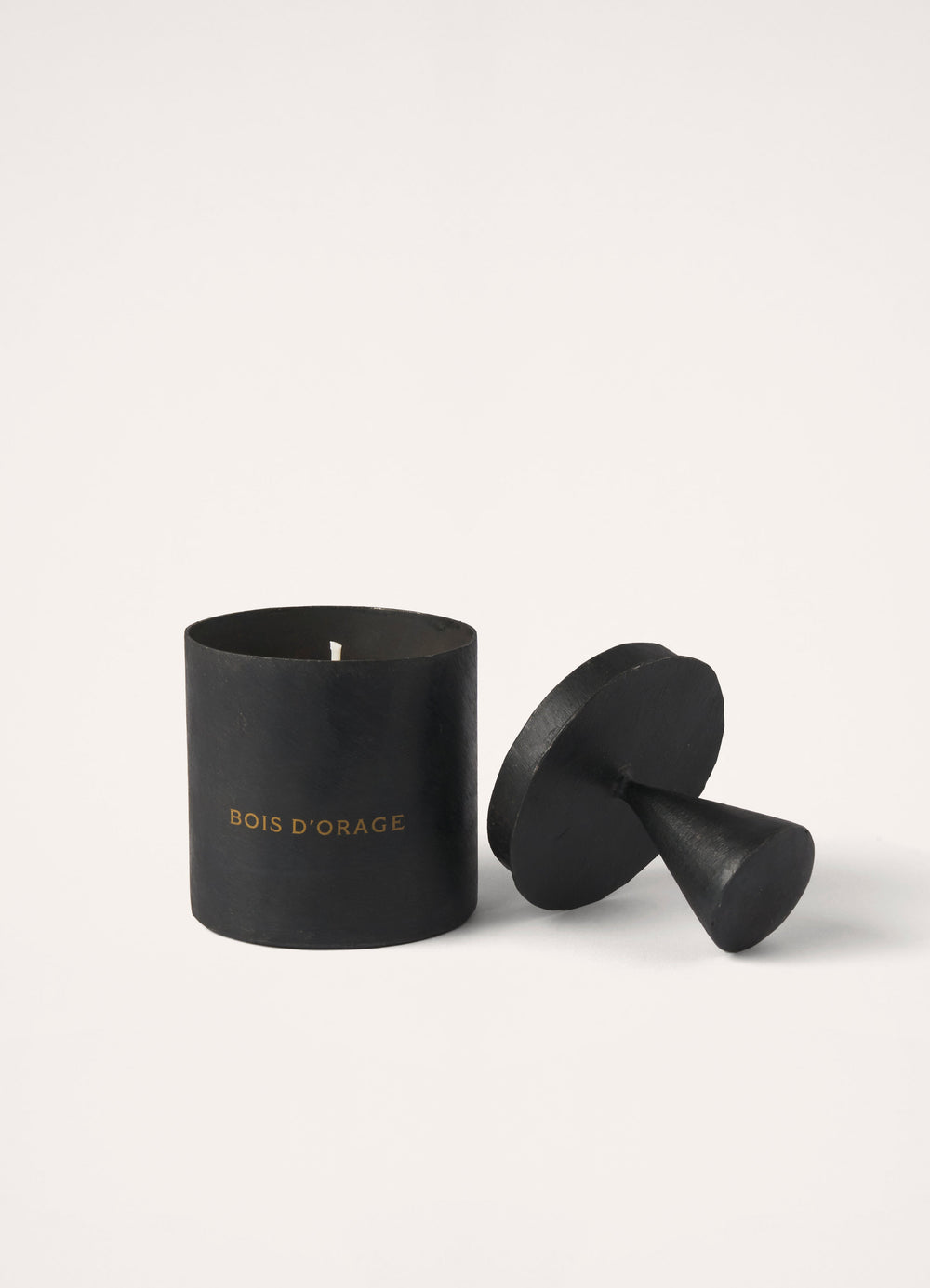 BOIS D’ORAGE Candle in Black Hand-Poured Wax, product shot, Front angled view Lid off, wax visible