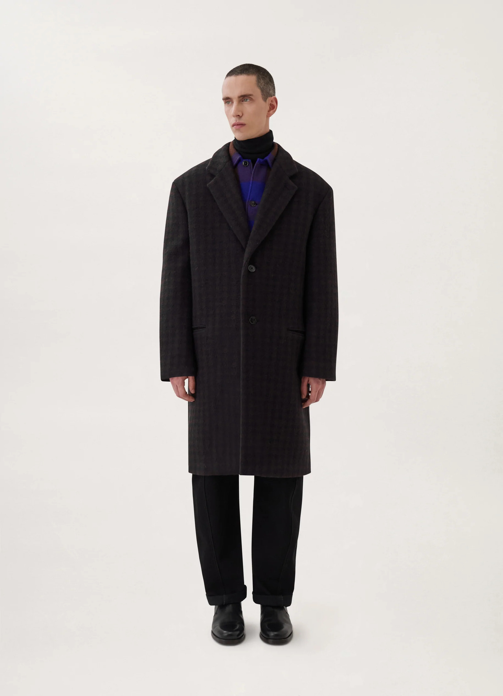 Lemaire chesterfield coat in brown/marine, model shot, side view houndstooth pattern